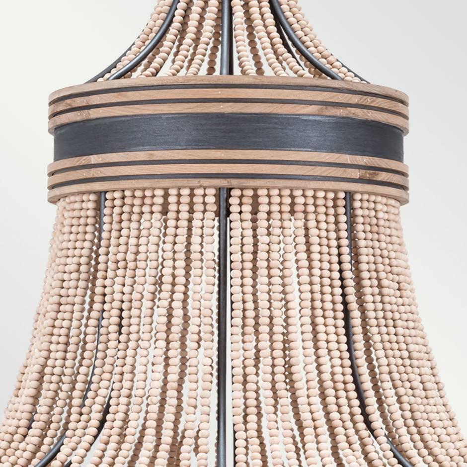 The Basque chandelier is a sculptural fete featuring cerused white oak beads and gray oak details. Light bulbs: 8 – candelabra medium base – 60 watt max (not included). Fully custom and made to order in California. UL Listed.
  