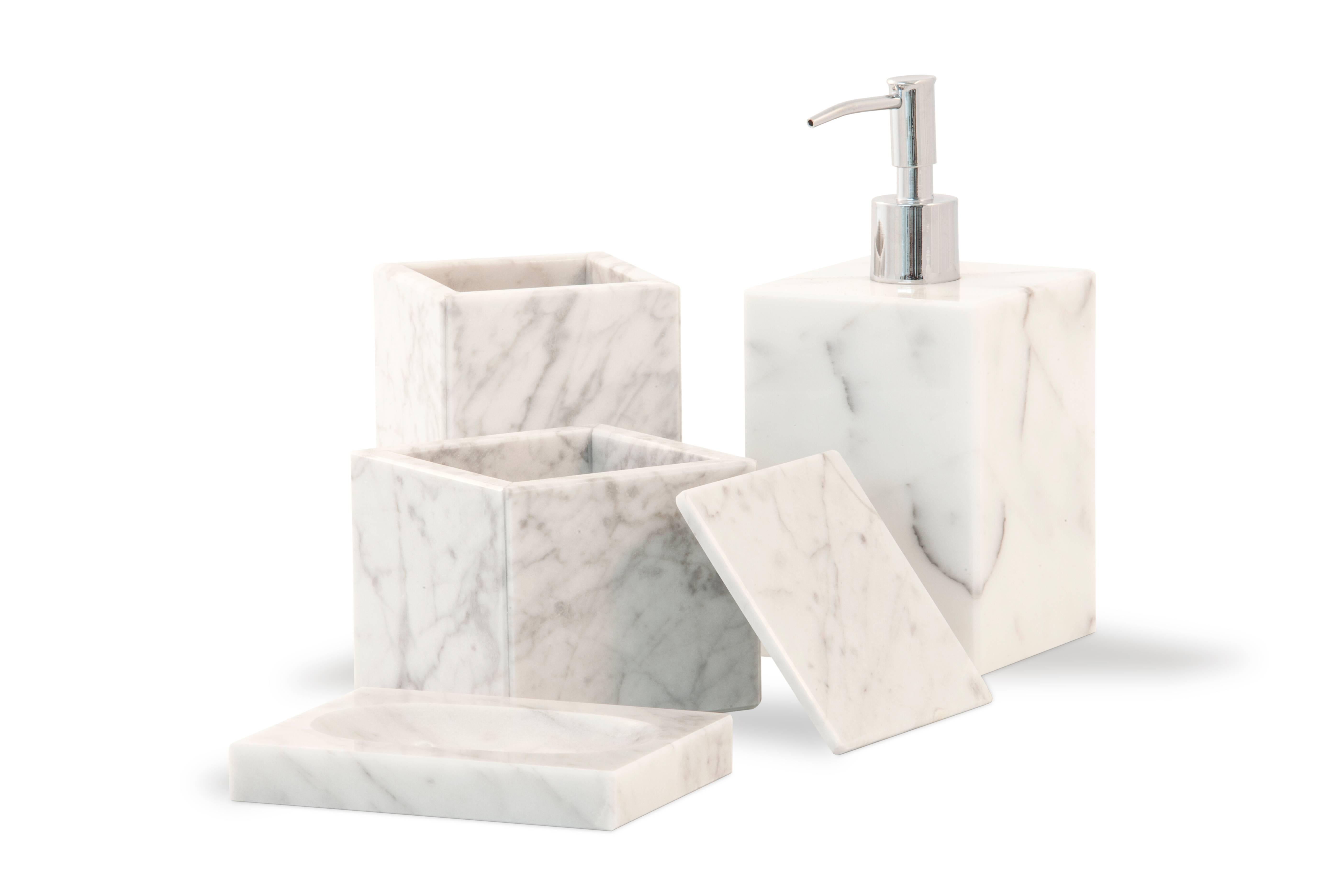 Squared shape soap dispenser in white Carrara marble with dispenser pump in stainless steel.
Each piece is in a way unique (since each marble block is different in veins and shades) and handcrafted in Italy. Slight variations in shape, color and