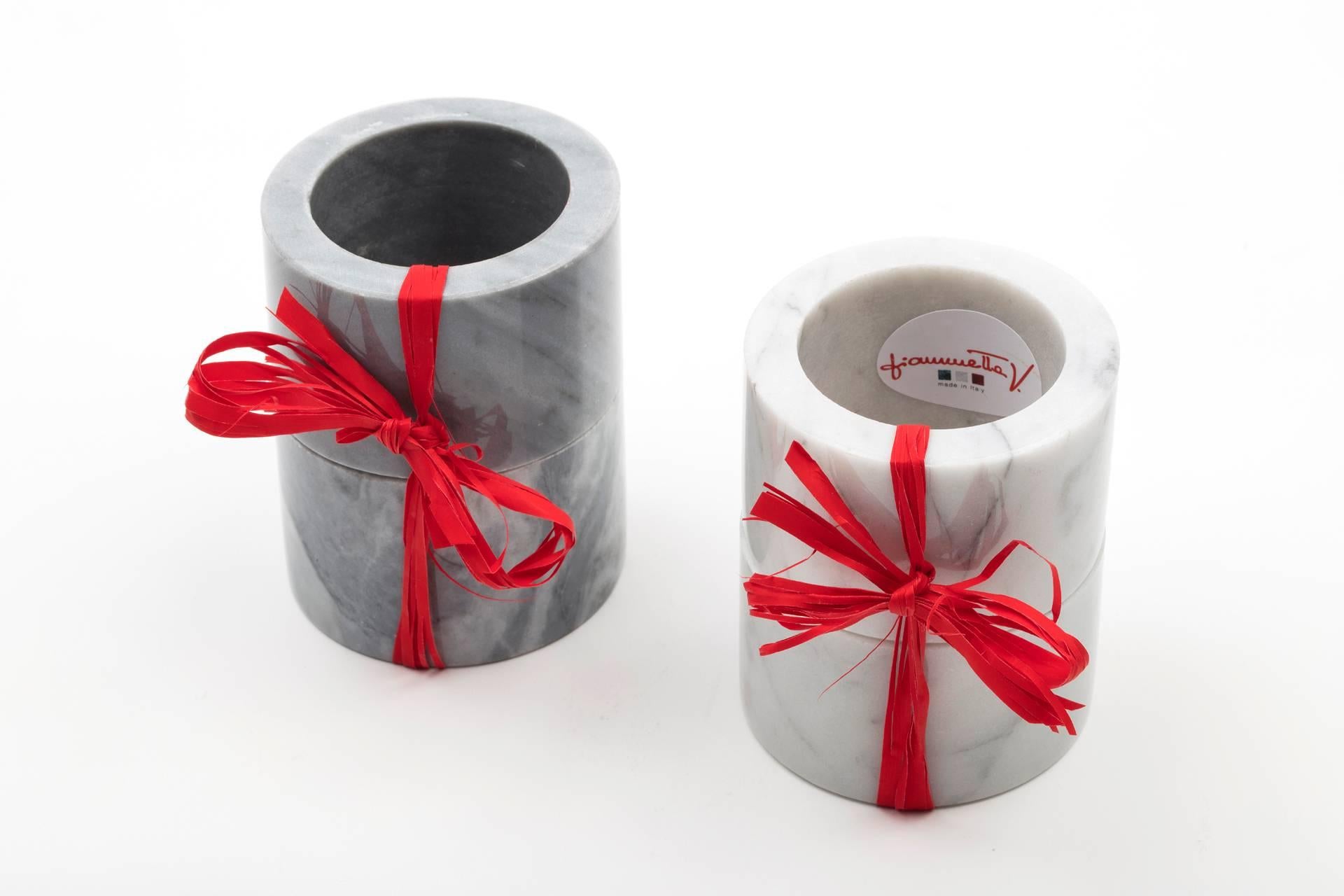 Set of two napkin rings in grey Bardiglio marble with a rounded shape.
Each piece is in a way unique (since each marble block is different in veins and shades) and handcrafted in Italy. Slight variations in shape, color and size are to be considered