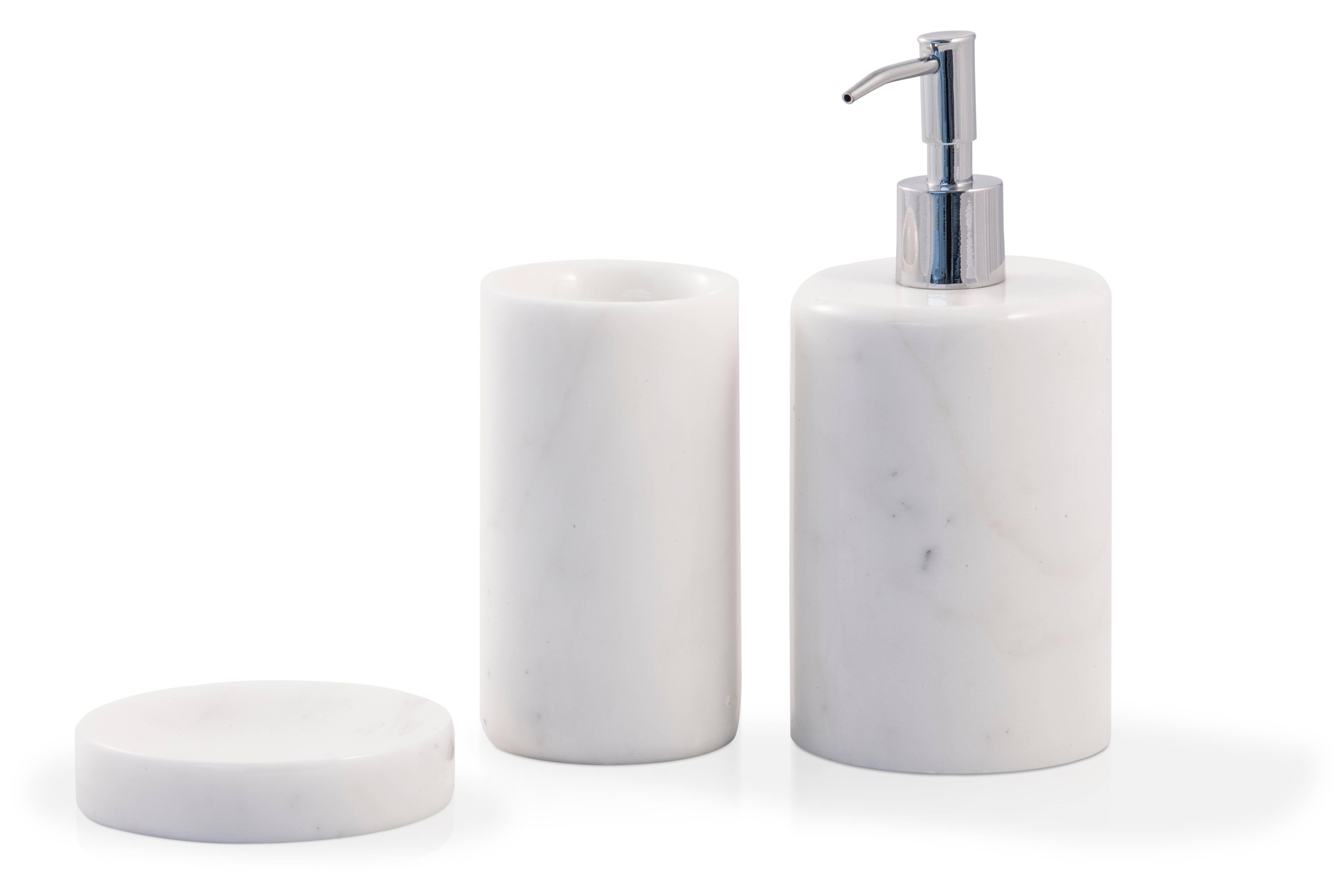 A rounded shape soap dispenser in white Carrara marble.
Each piece is in a way unique (since each marble block is different in veins and shades) and handcrafted in Italy. Slight variations in shape, color and size are to be considered a guarantee