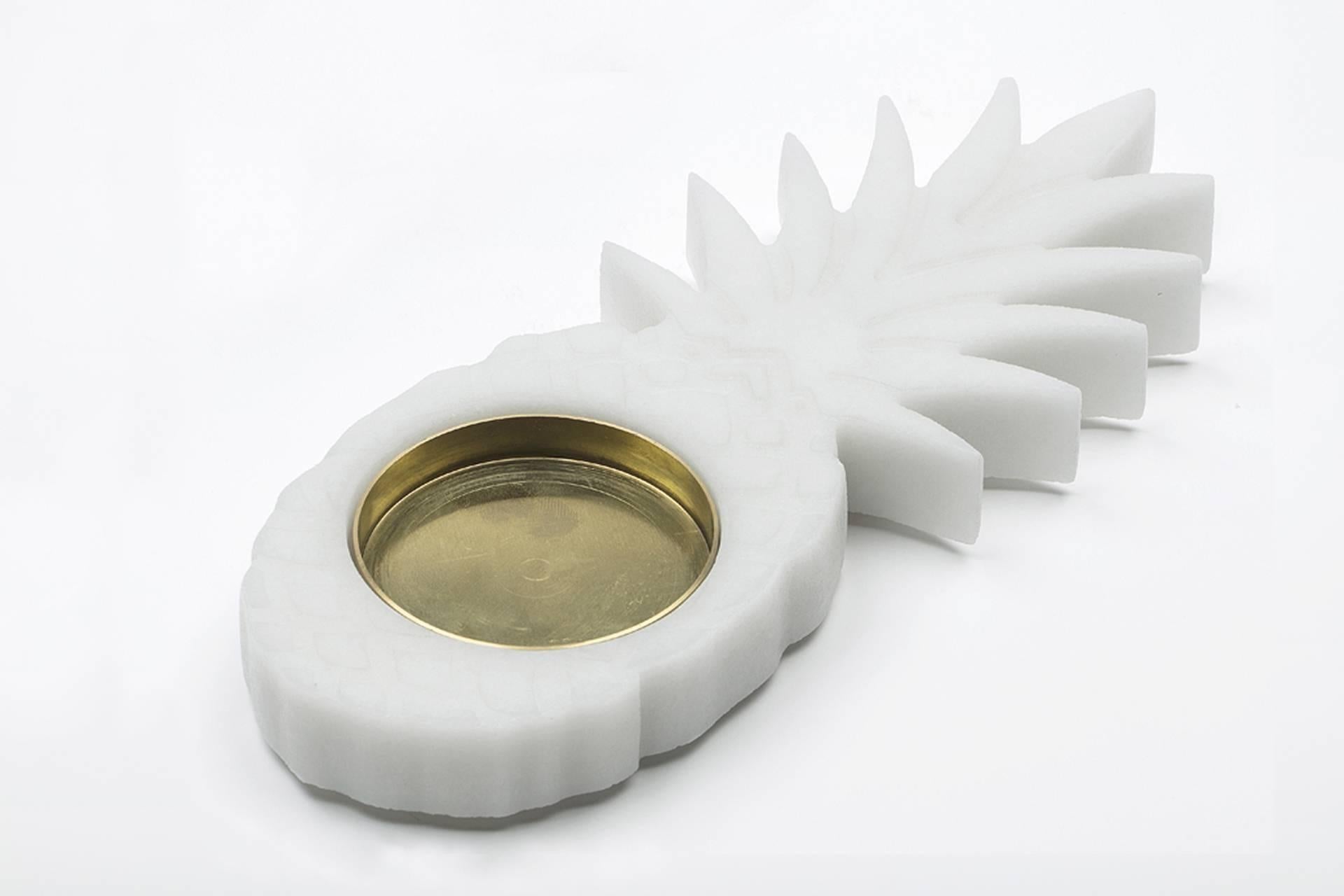 Small white Carrara marble ashtray with pineapple shape and brass plate. Each piece is in a way unique (since each marble block is different in veins and shades) and handcrafted in Italy. Slight variations in shape, color and size are to be