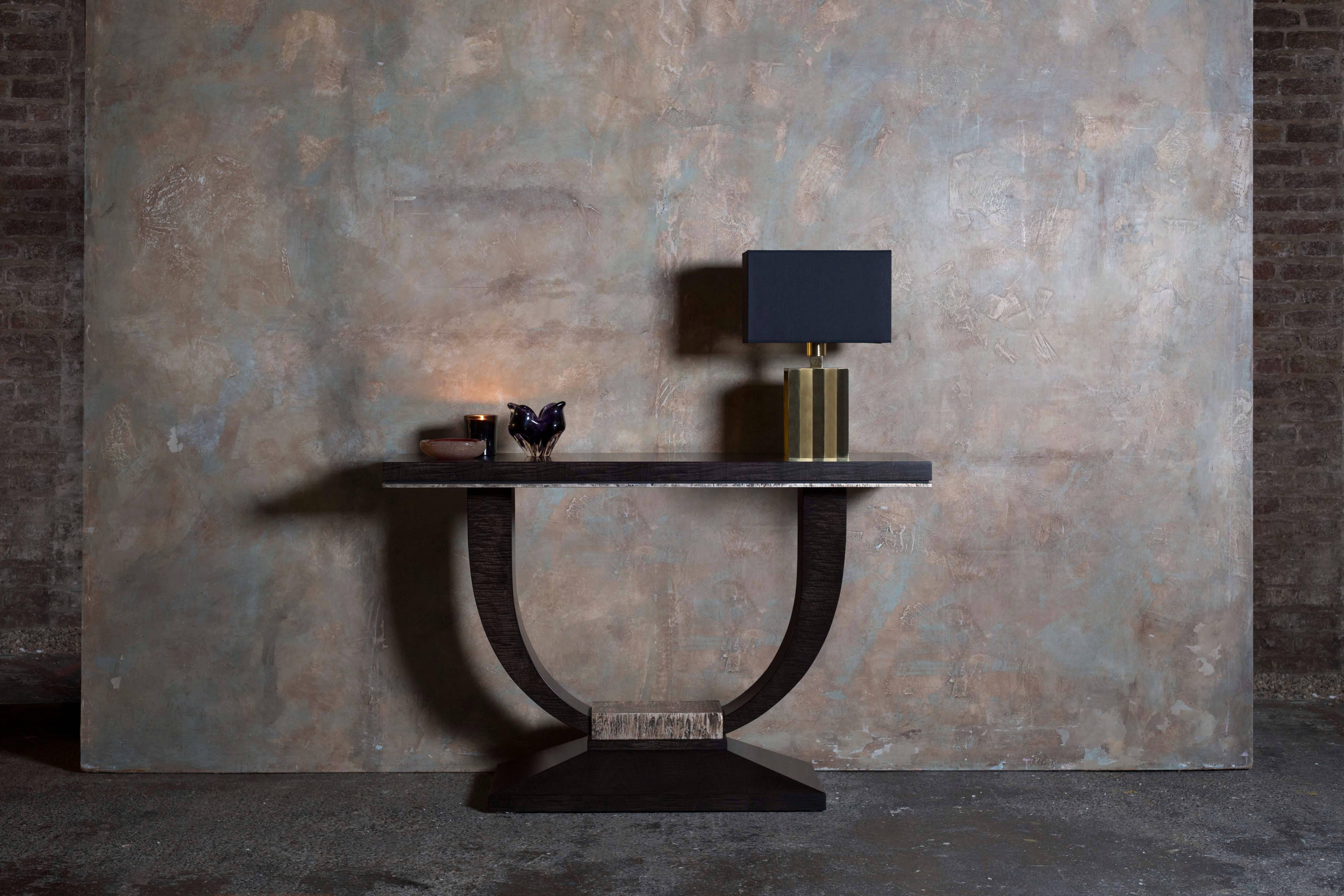 Celebrating the re-launch of a long standing favourite, the beautiful Albany console, now with a contemporary twist. Showcasing in the London showroom finished in hand tinted satin sycamore, featuring a new highly distressed silvered finish.

The