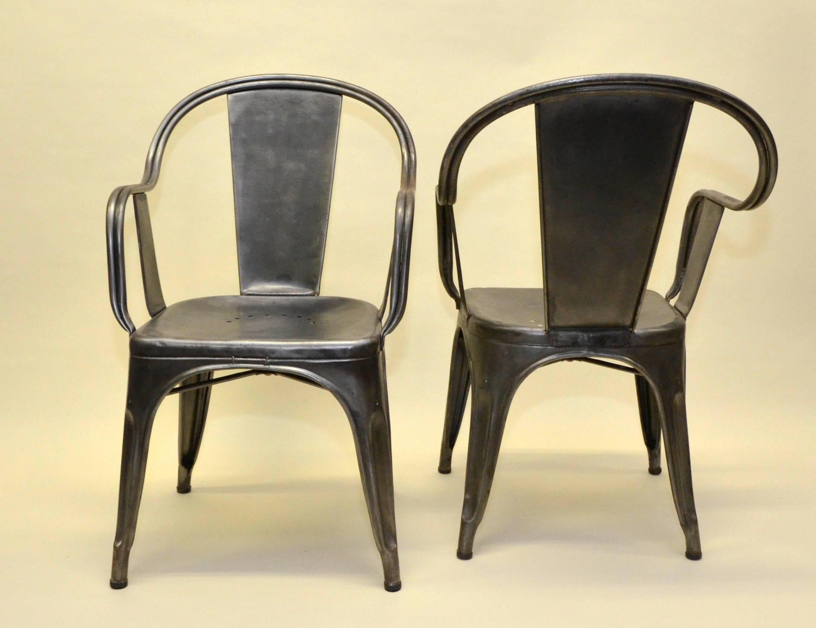 1950s pair of Tolix garden armchairs designed by Xavier Pauchard.
Originally enameled are now stripped of the coating and they can be used in interiors only.
Special feature of this armchair is the back chair realized with a double curved