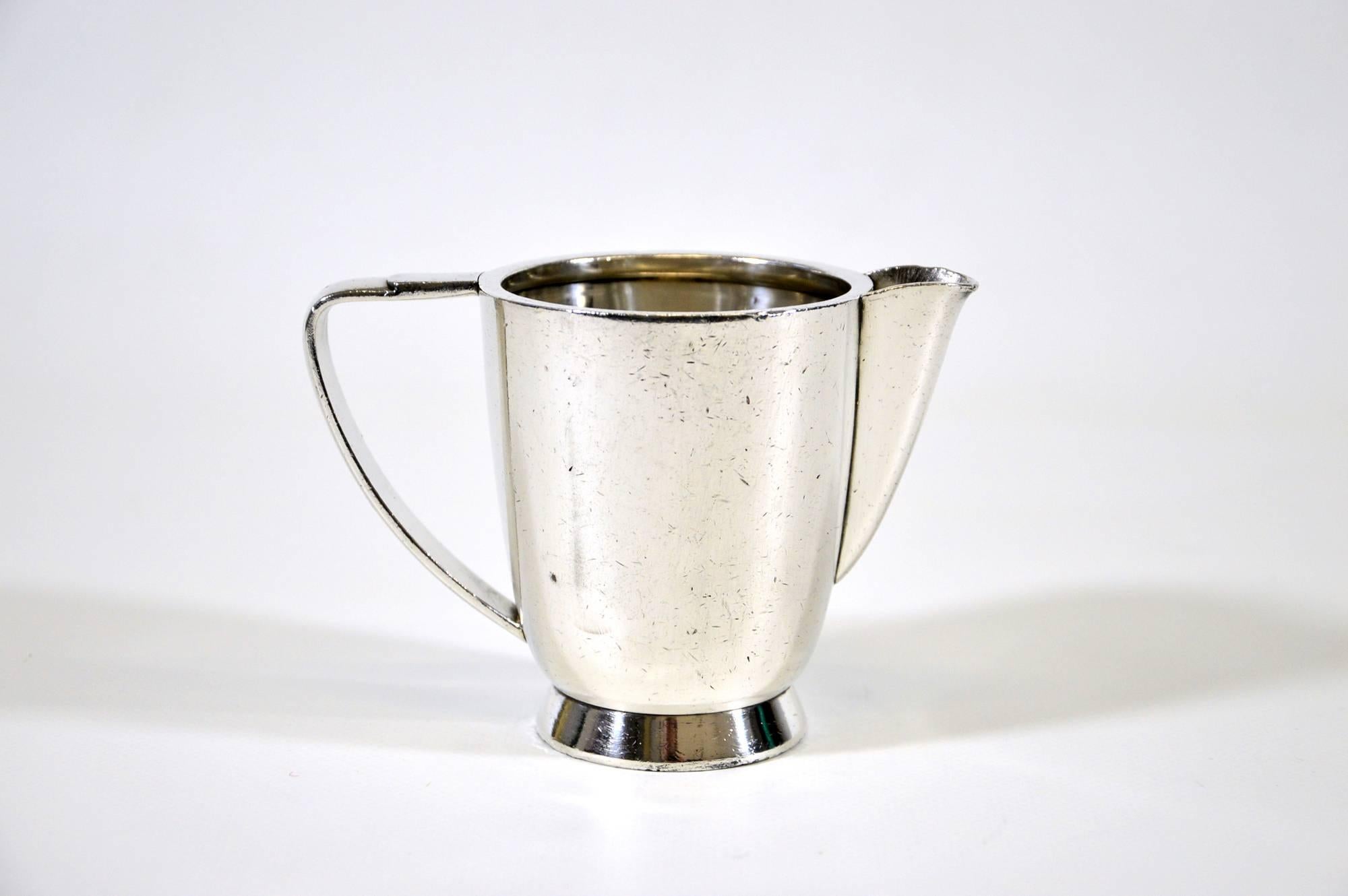 Silver plated alpacca milk jug, designed by Gio Ponti for Fratelli Calderoni, circa 1950. Coming from Palace Hotel in Rimini.
In good used condition, with some traces of use.