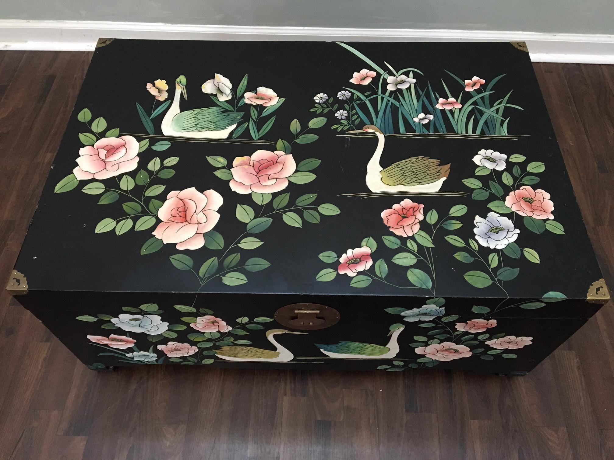 Hand painted Asian style trunk with brass hardware and Ming legs. Solid wood. Good vintage condition with some abrasions to finish.