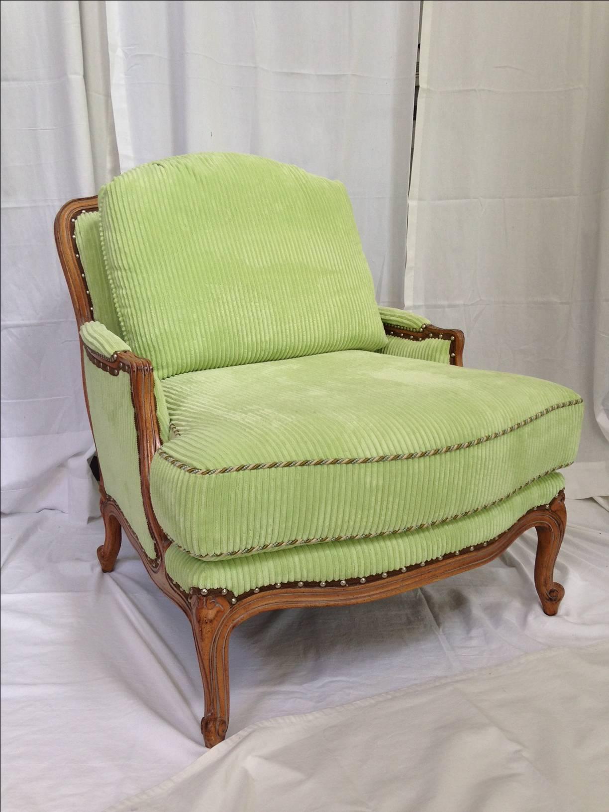 Bergère club chair and ottoman by Taylor King. Custom upholstered in a velvety soft ribbed chenille in a soft green. Excellent condition.

Dimensions: 33