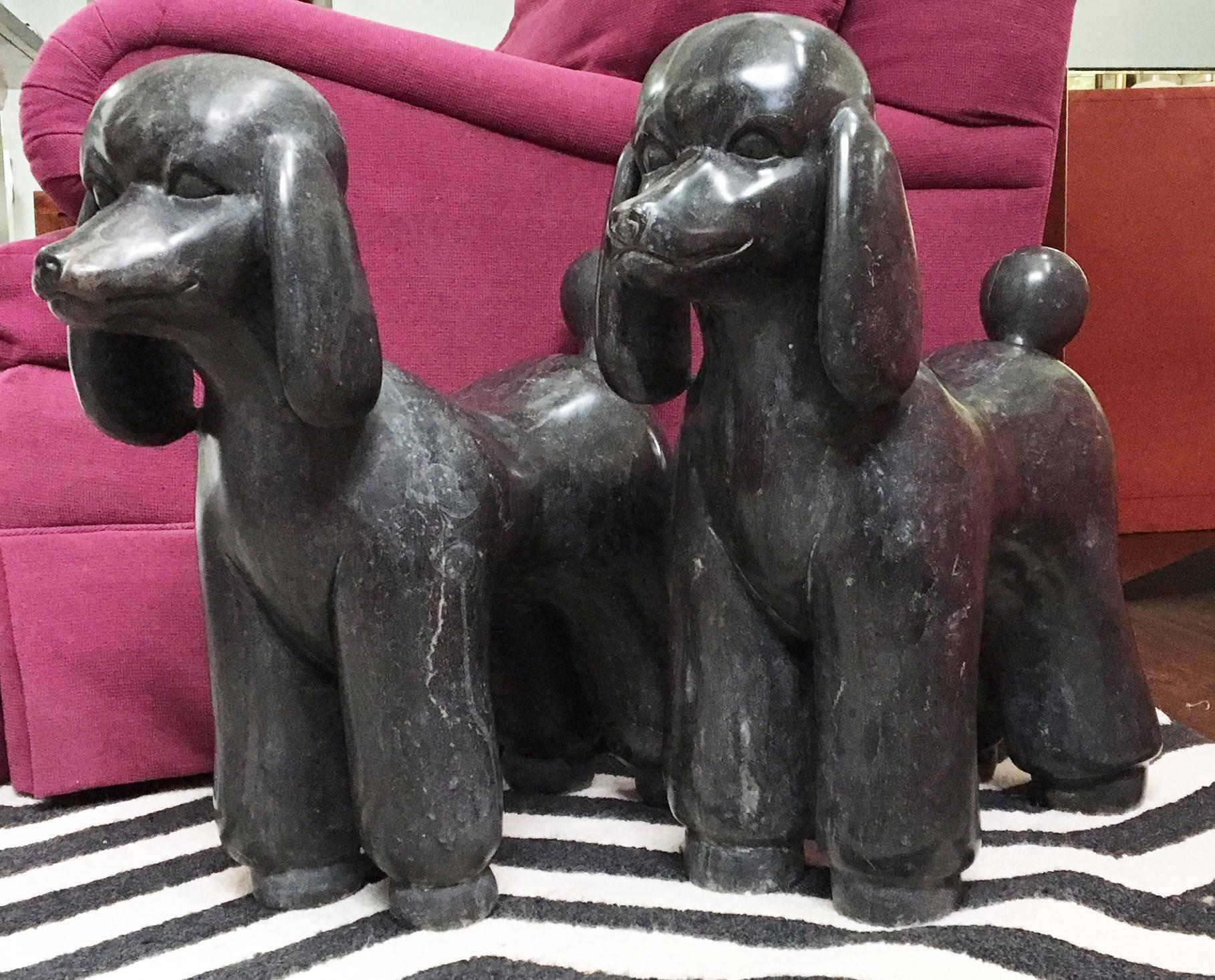 What Hollywood Regency decor would be complete without a pair of large dog statues? This solid marble pair by Mancini of Italy have a glossy finish and stand 24