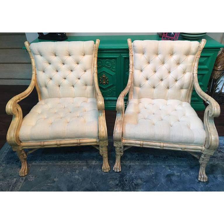 Pair of accent chairs by Maitland-Smith. Bamboo with claw foot detailing and tufted linen seat and back. Excellent condition. Fabric is excellent, no stains, marks, holes or tears. Some small marks at feet.
Seat height is 17