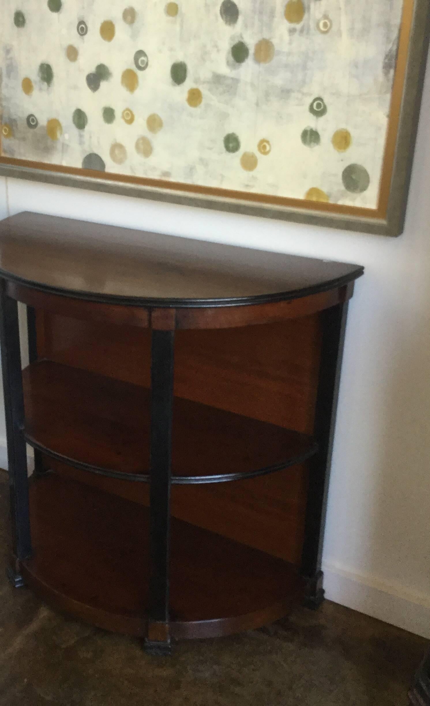 Demilune etagere table in walnut with inlaid design on top. Subtle black accents, Italy.