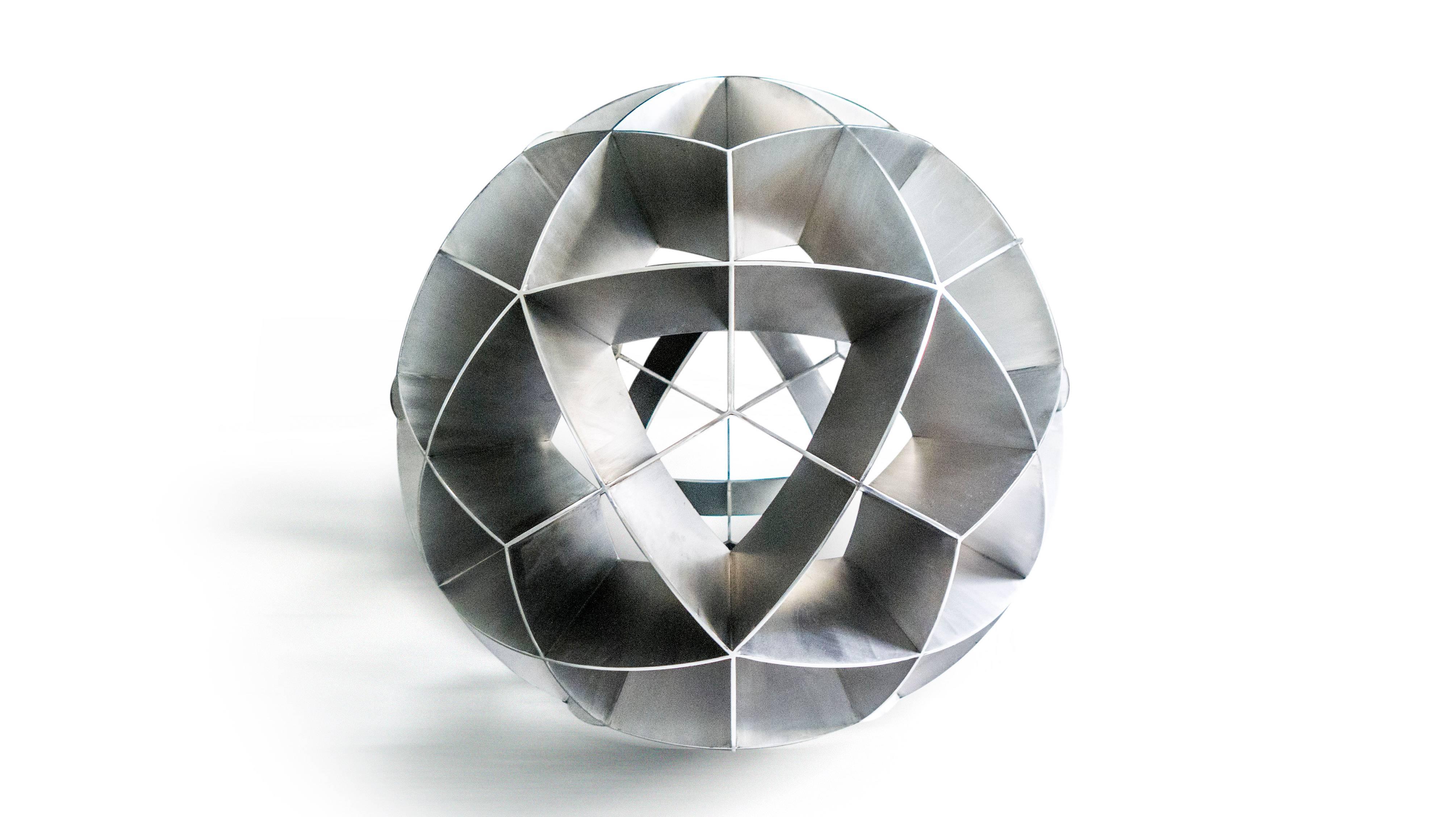 This is a one of a kind stainless steel sculpture created by renowned Mexican designer Pedro Cerisola, whose work is in the permanent collection of the National Autonomous University Science Museum and has been exhibited in the Franz Mayer Design