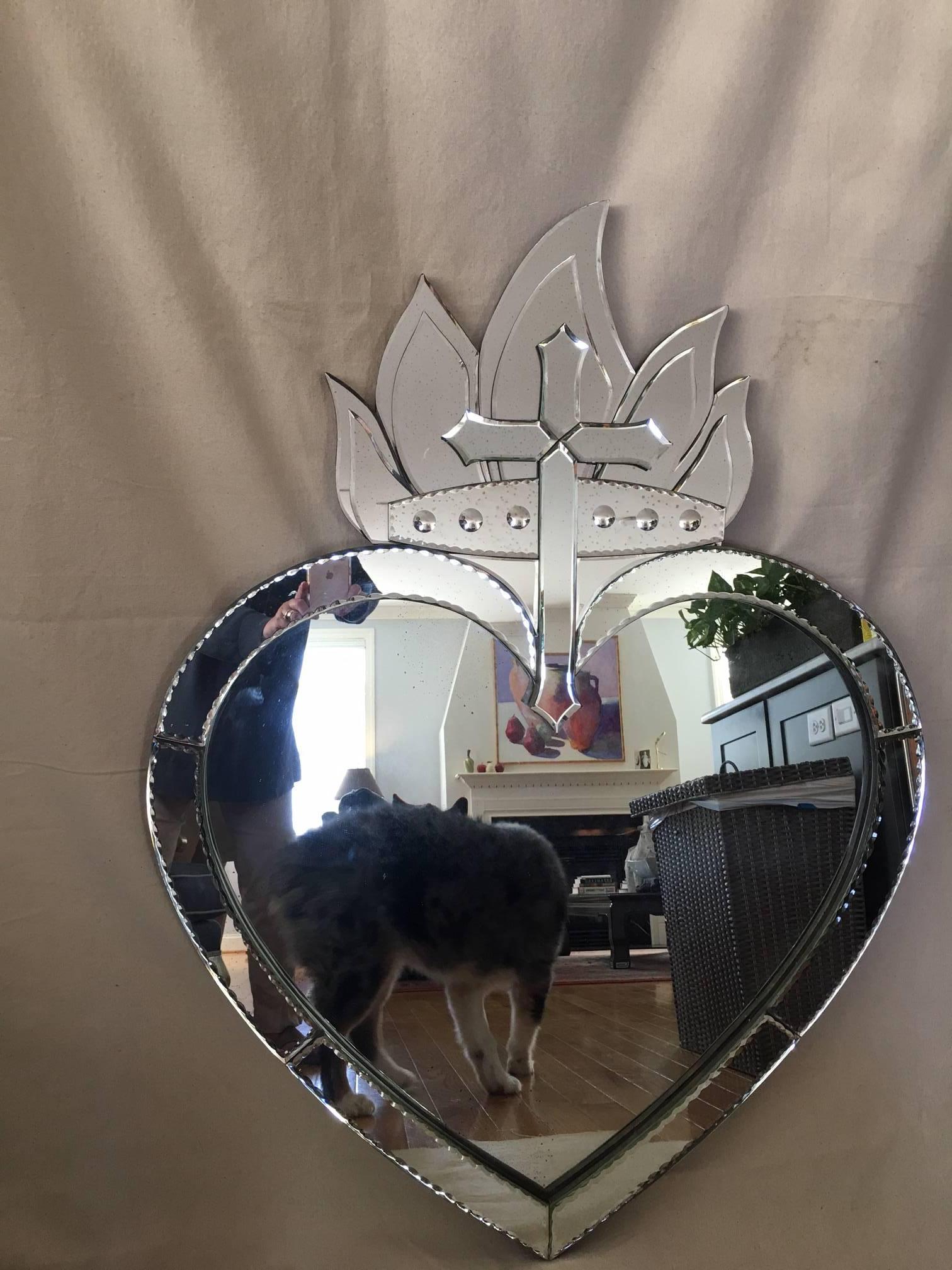 This amazing mirror is in excellent condition. 
It was produced by Currey and is a notch above your average mirror. 
It is beveled throughout.