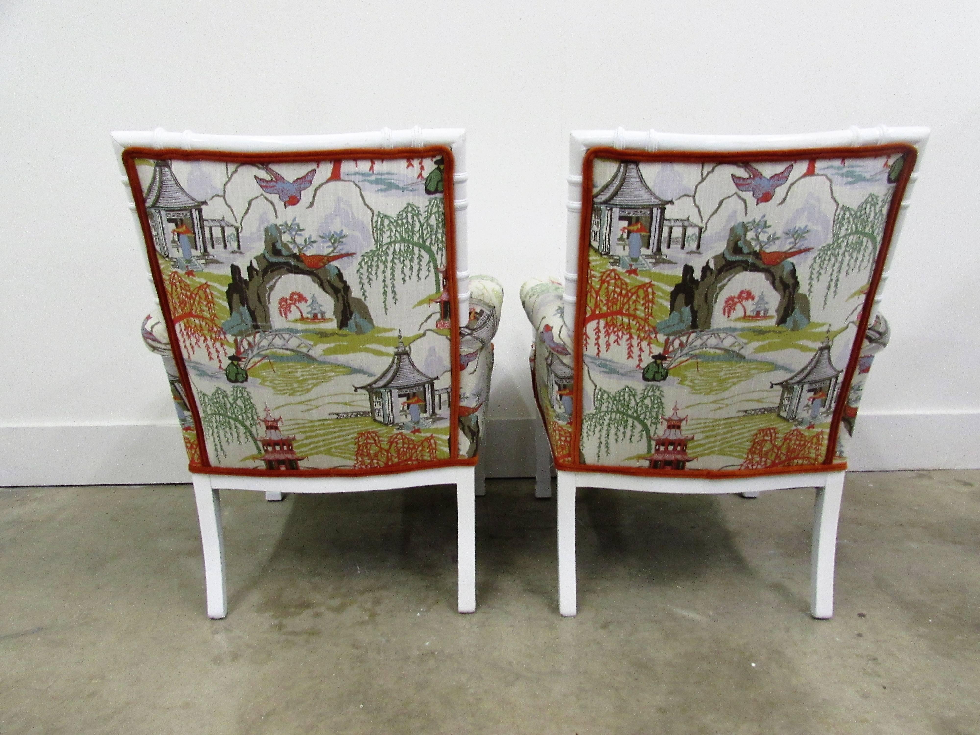 Pair of vintage chinoiserie and faux bamboo armchairs adorned in Robert Allen Toile Fabric with mohair coral piping and customized by The Lacquer Studio in white high gloss finish.
Measure: Seat height 18.5