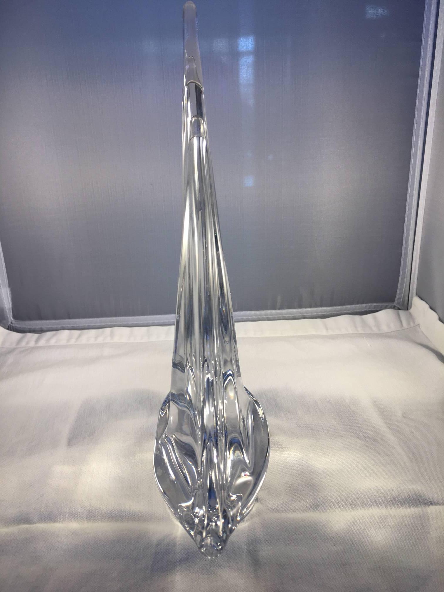 This fluid crystal sculpture is signed Daum, France. It is substantial and flawless.