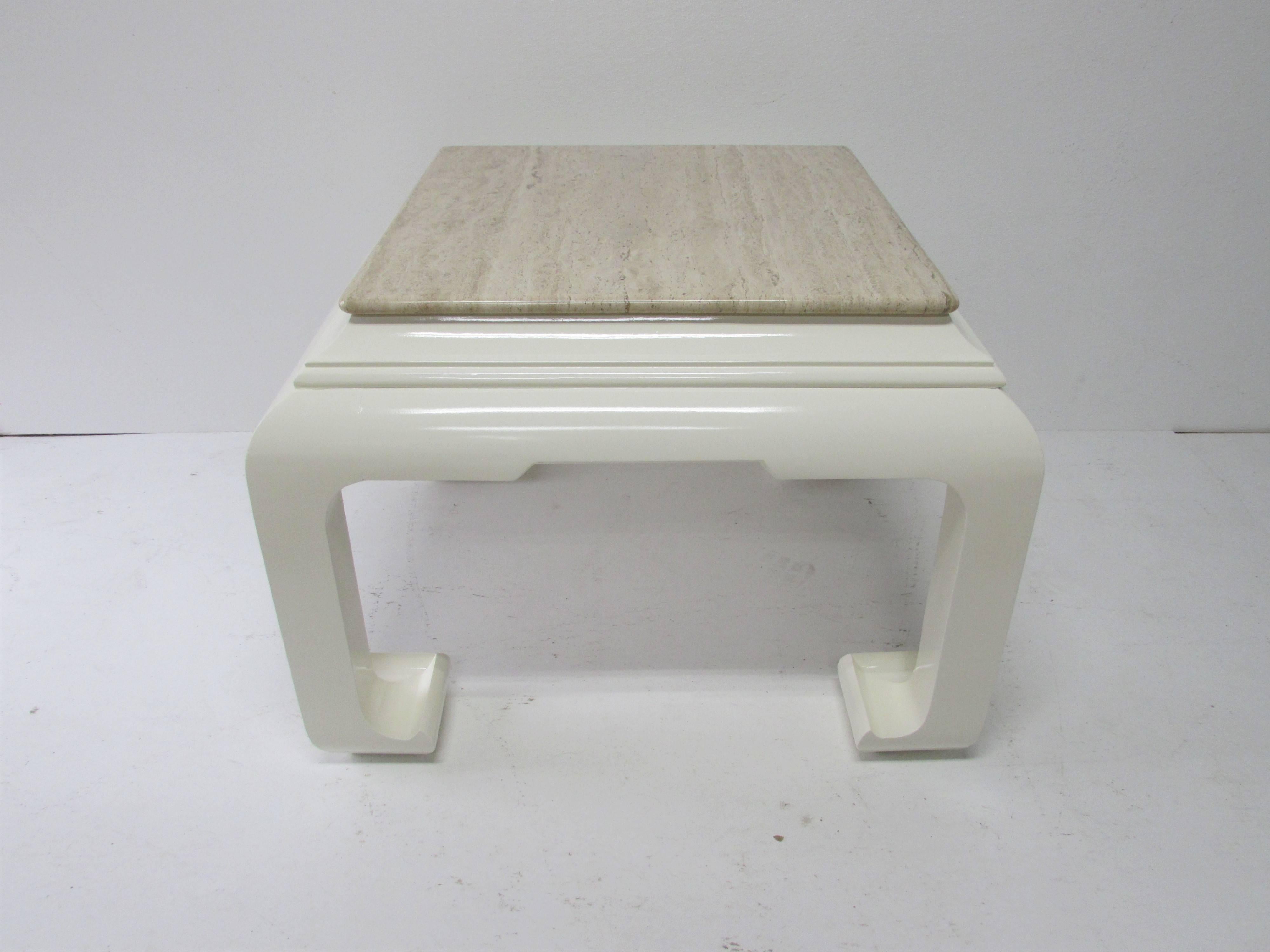 Side table with exaggerated Ming style legs and lacquered in-house in Alabaster high gloss finish with a French travertine removable top.