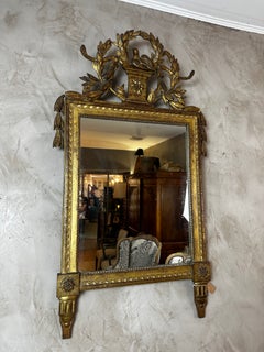 Louis XVI Period Giltwood Mirror with Bird and Laurel Decoration