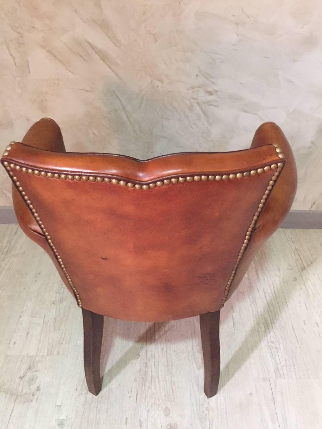 Midcentury Leather Moustache Bridge Armchair In Good Condition In LEGNY, FR