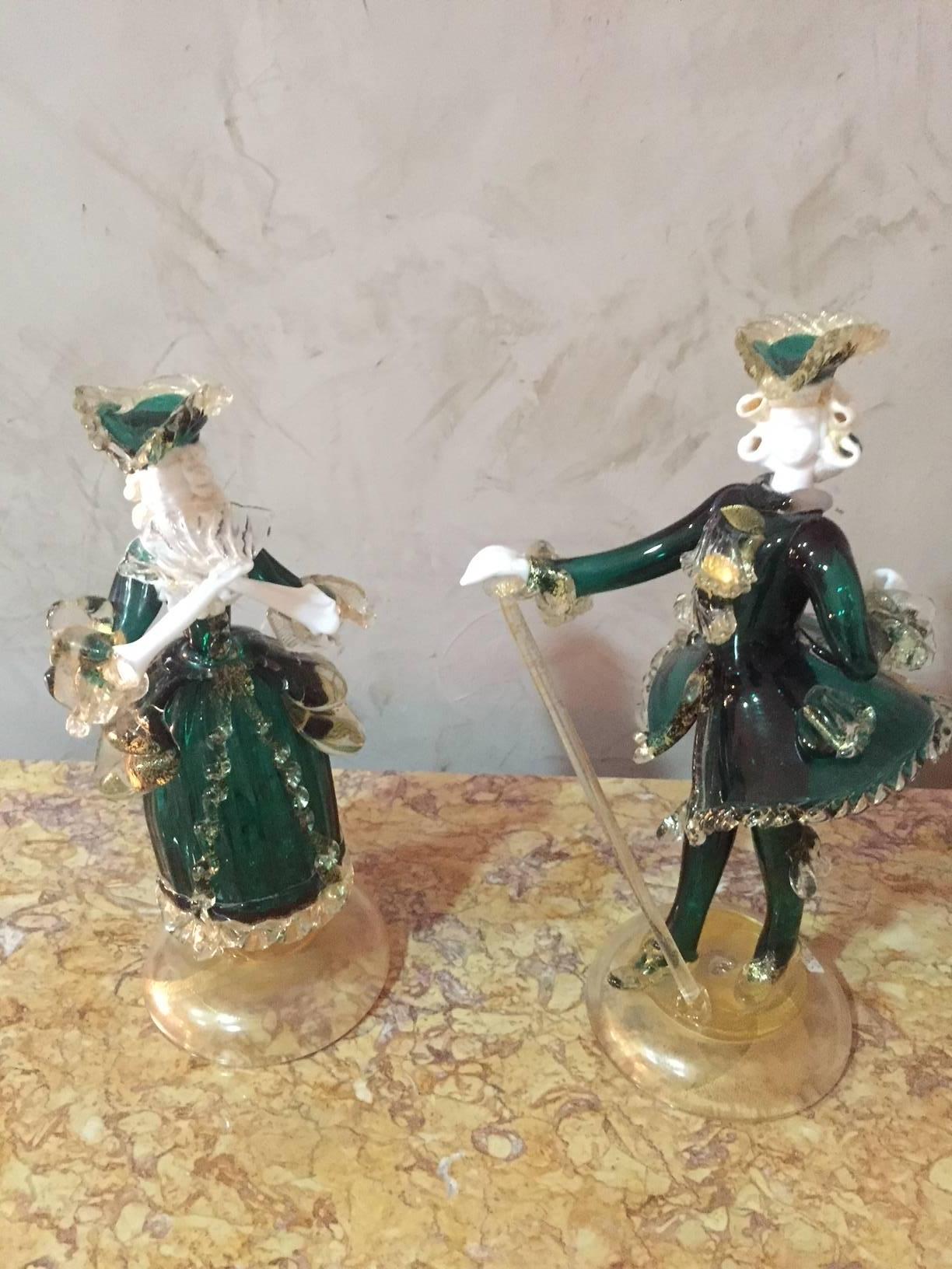Venitian dancing couple in Murano glass, 1950s. Good condition, no broken elements.
Very delicate work. The couple is wearing traditional green clothes.
The Murano Island is known to make blown glass.