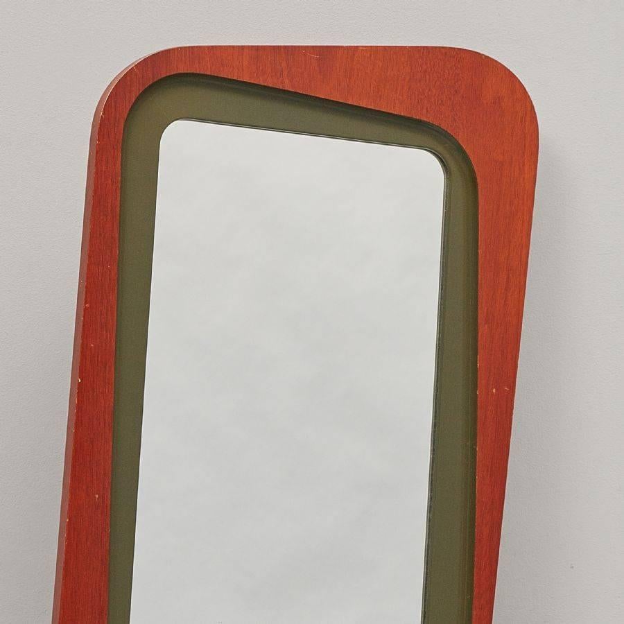 Bi-colored captivating shape mahogany mirror produced for 