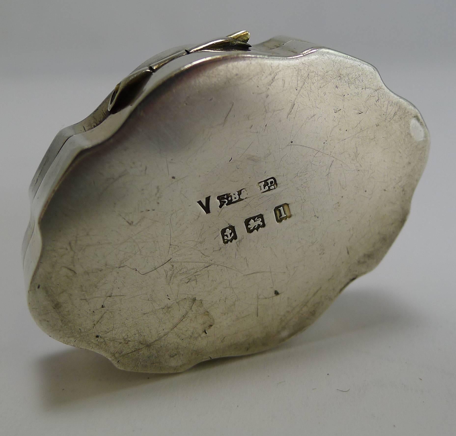 A most unusual and beautifully shaped pill box made from English sterling silver fully hallmarked for Birmingham 1910 together with the makers mark for the silversmith, S. Blanckensee & Son Ltd,

The lid is beautifully decorated with a turquoise