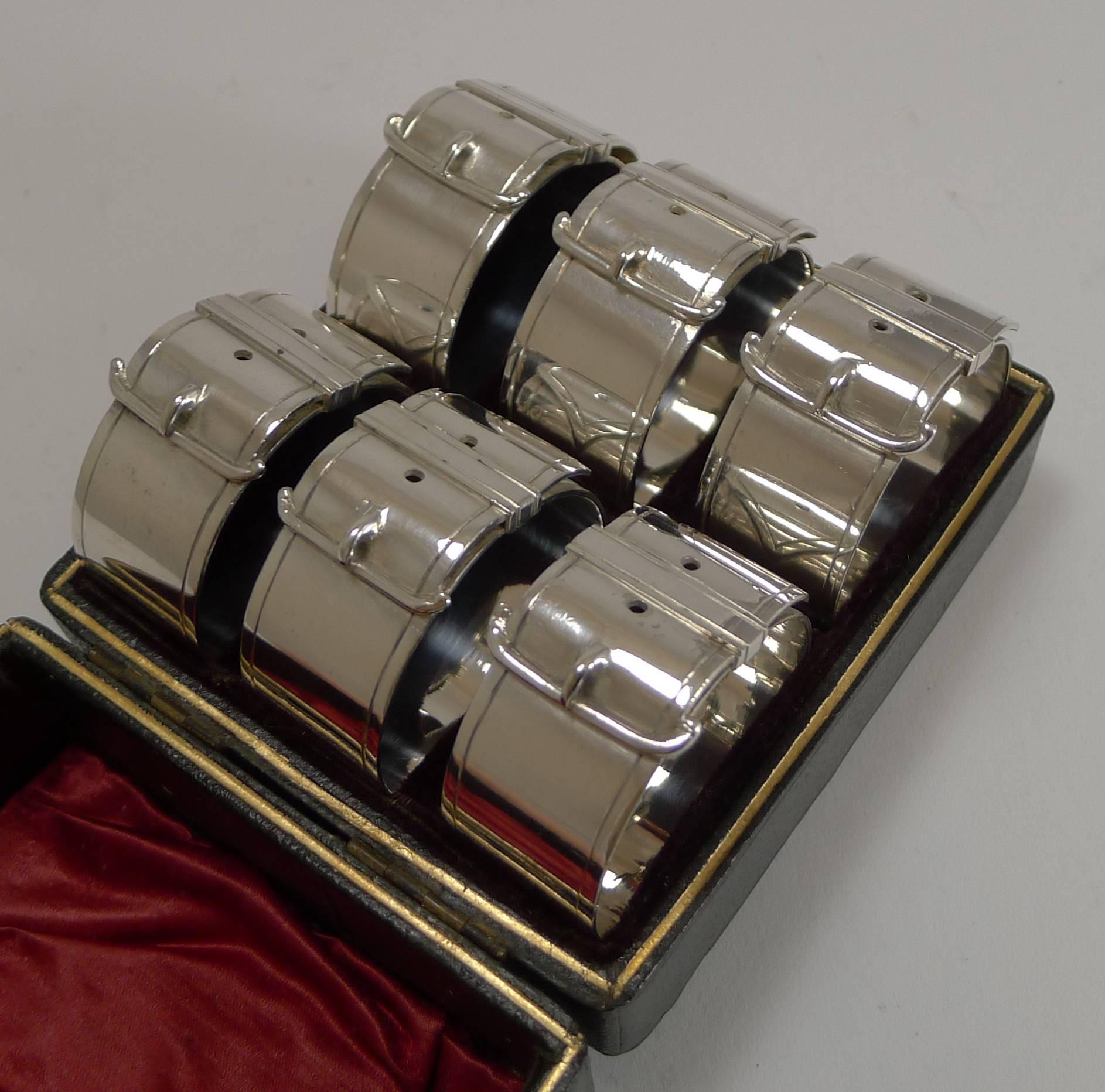 A fabulous quality set of six silver plated napkin rings in beautiful condition and still in their original presentation box.

All are cast with a belt buckle design, a motif popular in the late Victorian era, these dating to circa 1890.

The