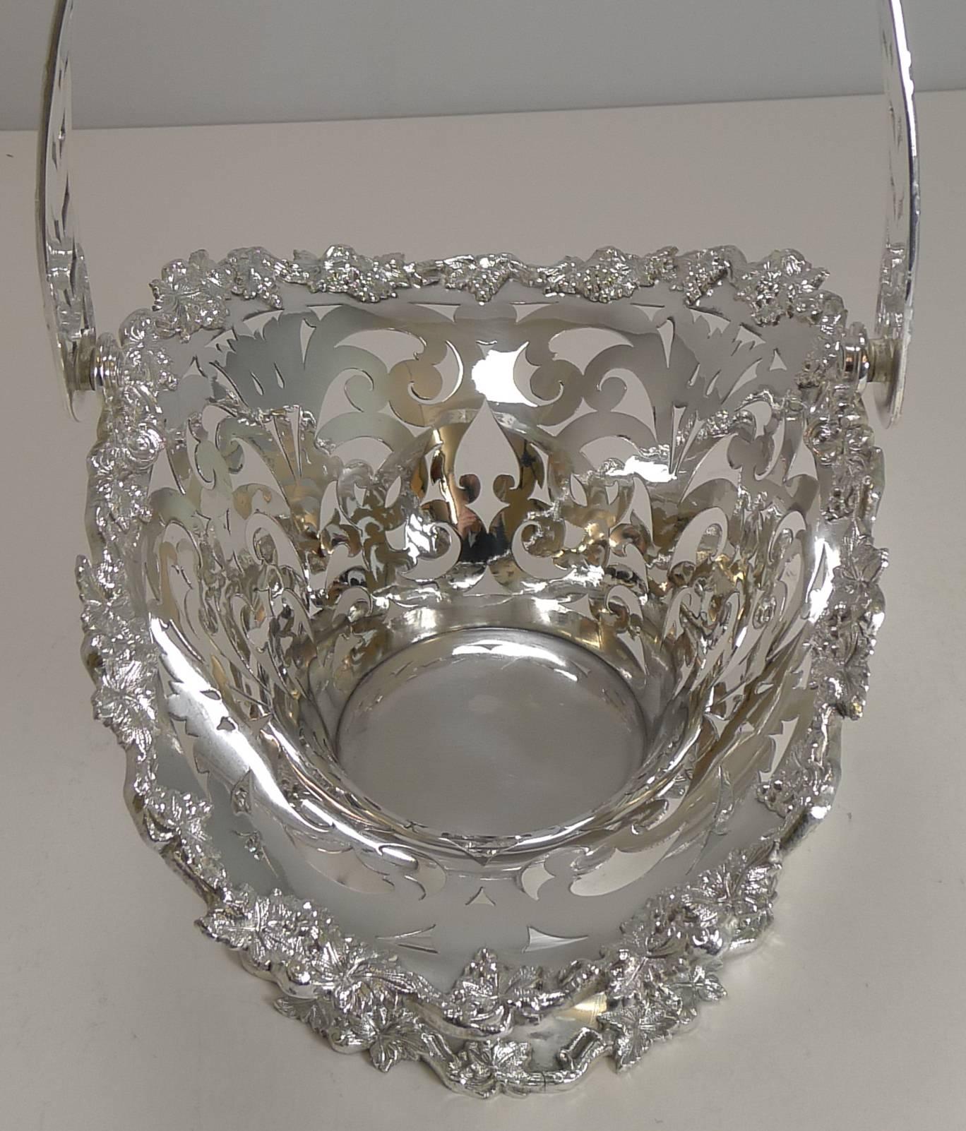 An absolutely stunning silver plated basket, dating to circa 1900; perfect for fruit, cakes or simply to enjoy it's beauty.

The basket is beautifully reticulated or pierced; the rim and foot having a raised border featuring grapevines. The