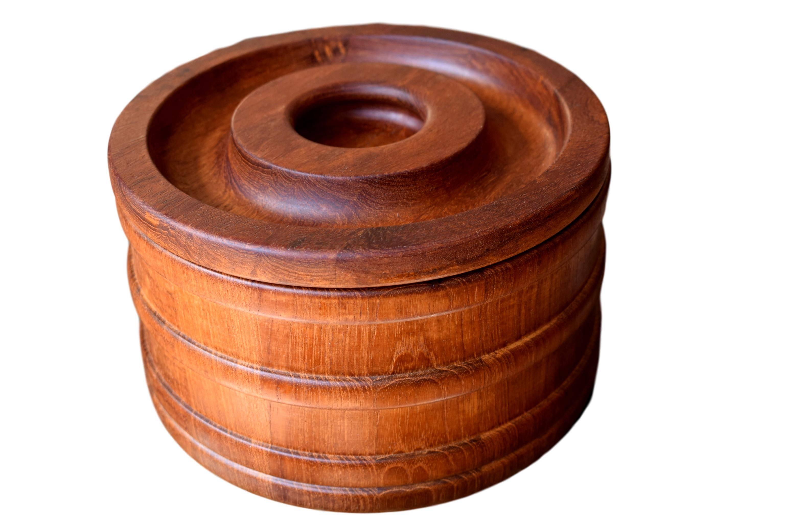 A Danish midcentury ice bucket by Jens Harald Quistgaard (1919-2008) made from staved teak. 

Stamped 