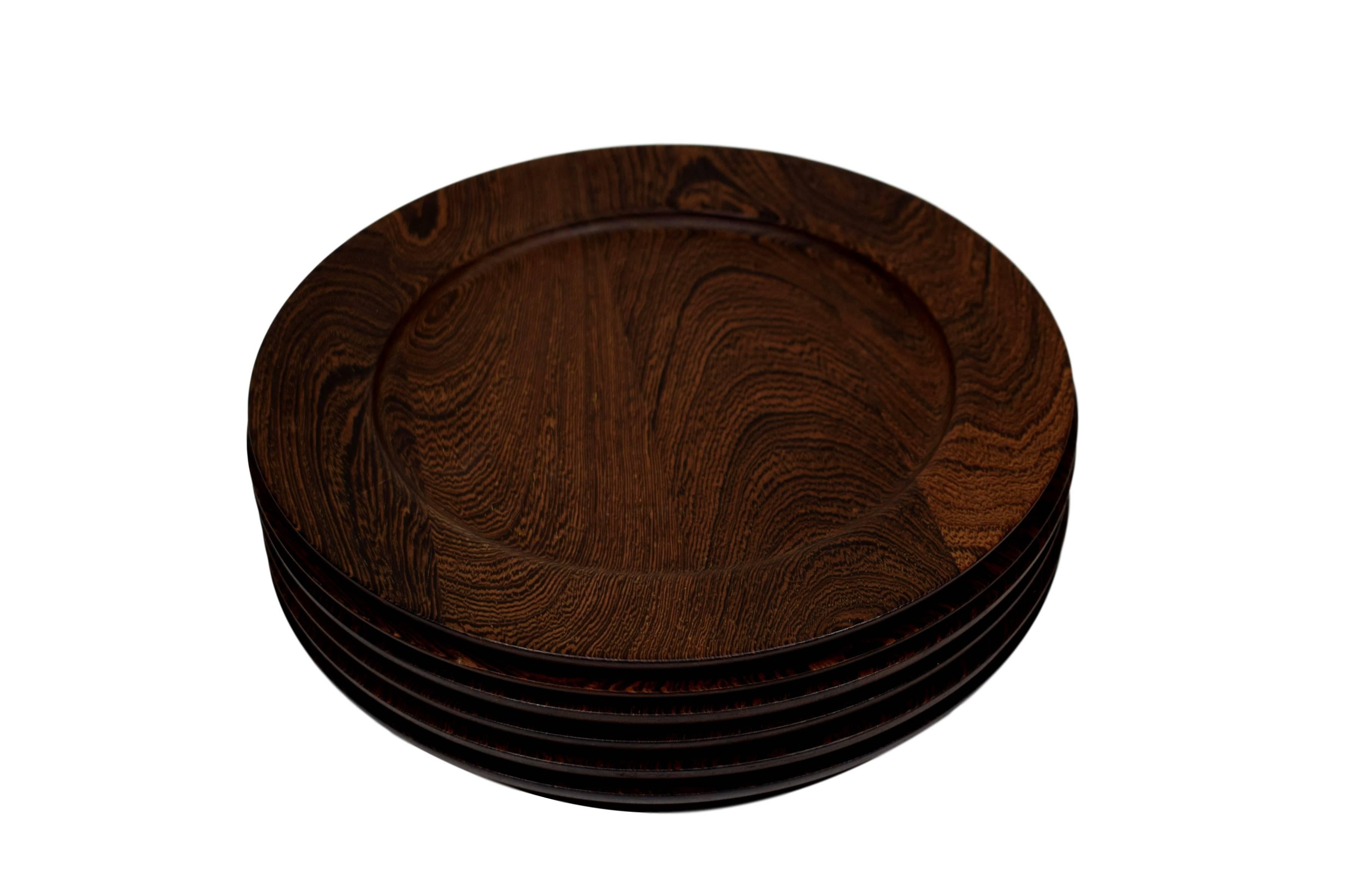 A set of six Danish midcentury cover plates produced by Ehrenreich. Made from wenge. 

Stamped 