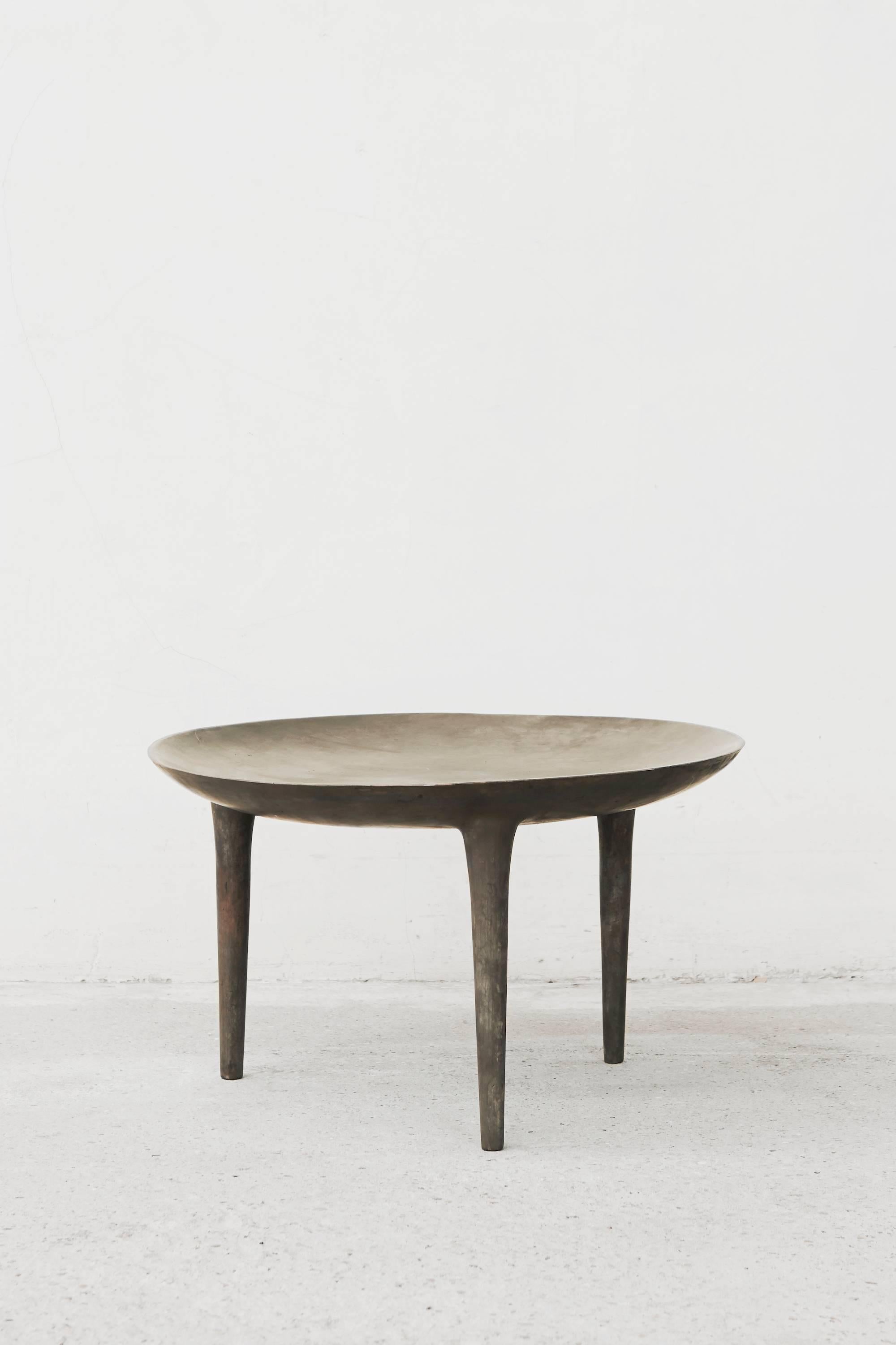 Occasional table in nitrate bronze in grey by Paris-based fashion and furniture designer Rick Owens.