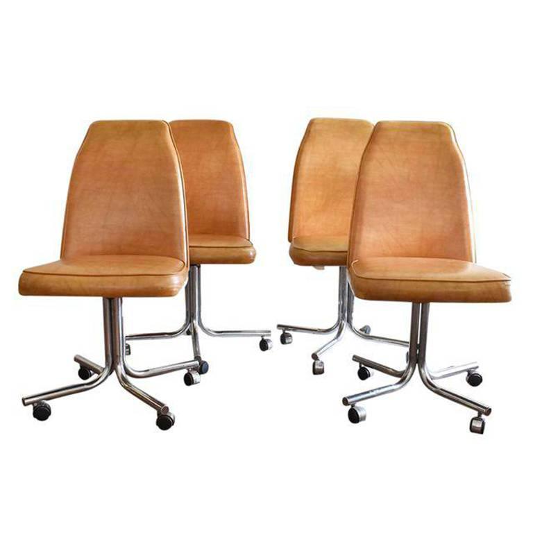 Midcentury and Chrome Rolling Brown Bucket Chairs, Set of Four