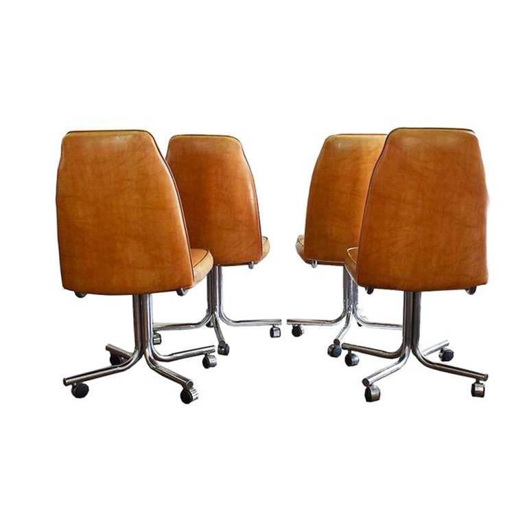 Mid-Century Modern Midcentury and Chrome Rolling Brown Bucket Chairs, Set of Four