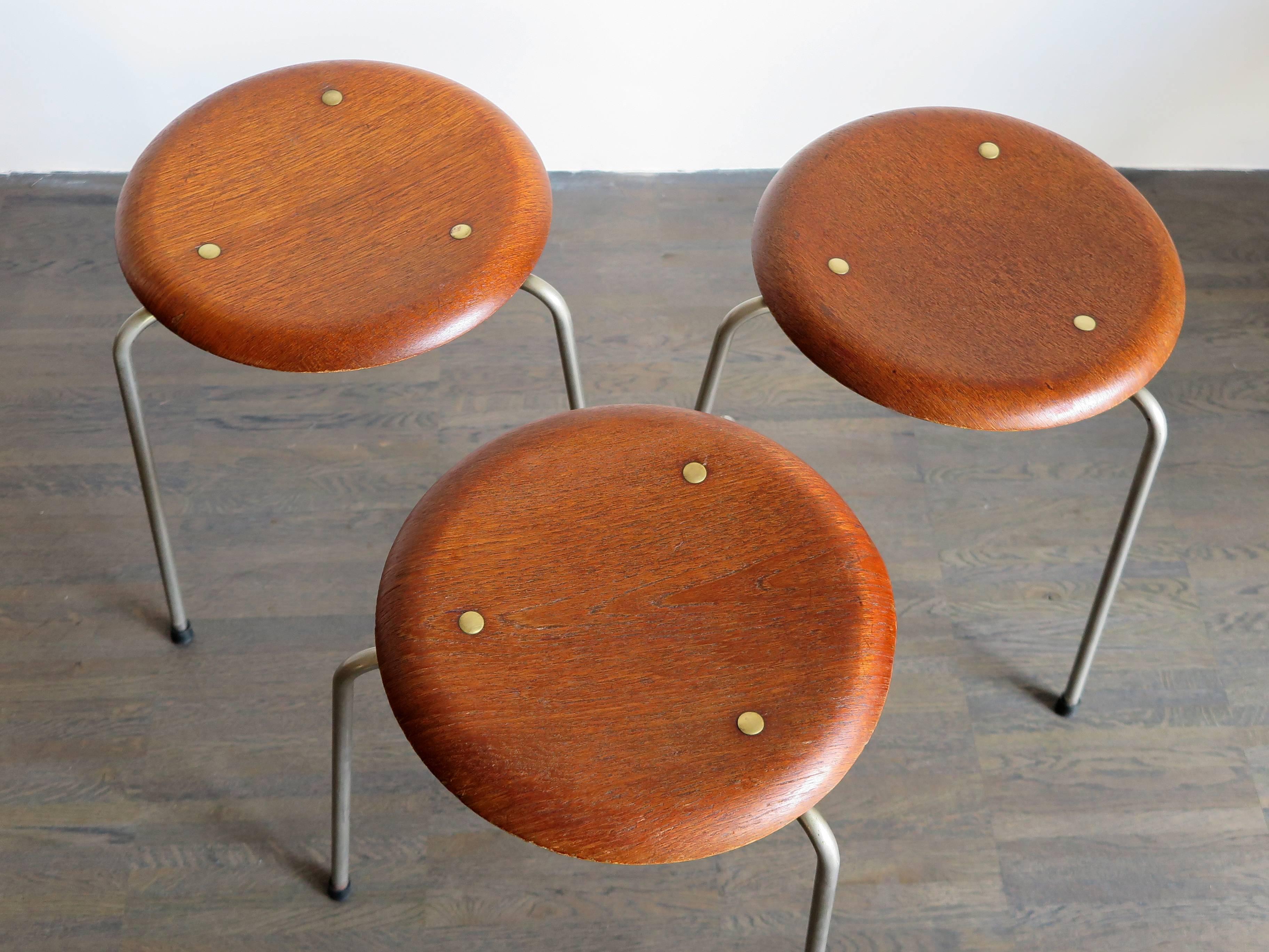 1950s very rare Danish and Scandinavian circle stools designed by Arne Jacobsen for Fritz Hansen, first edition with brass dot.