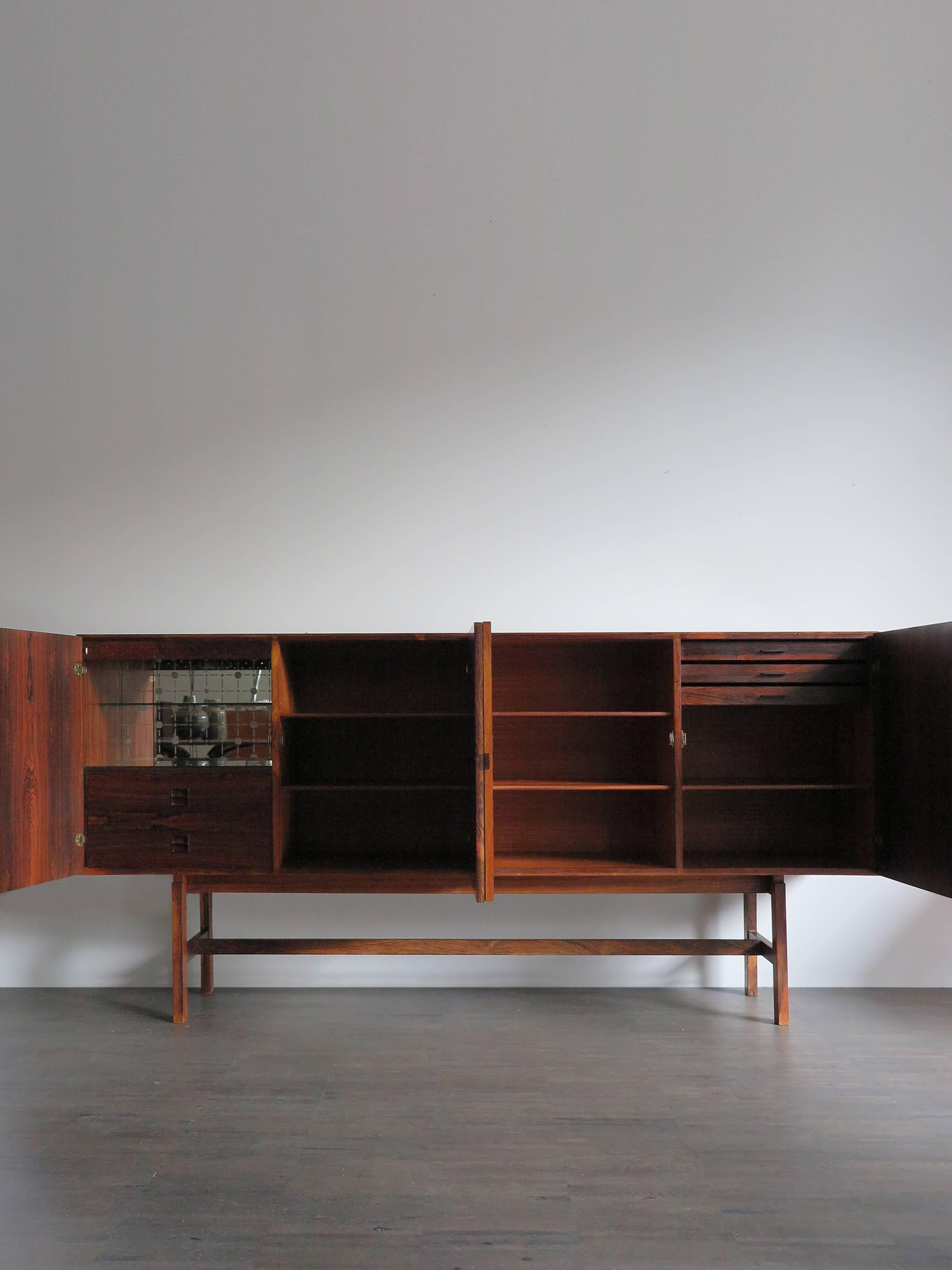 Danish and Scandinavian rosewood big or hight sideboard designed by Arne Vodder with bar space inside, circa 1960s.