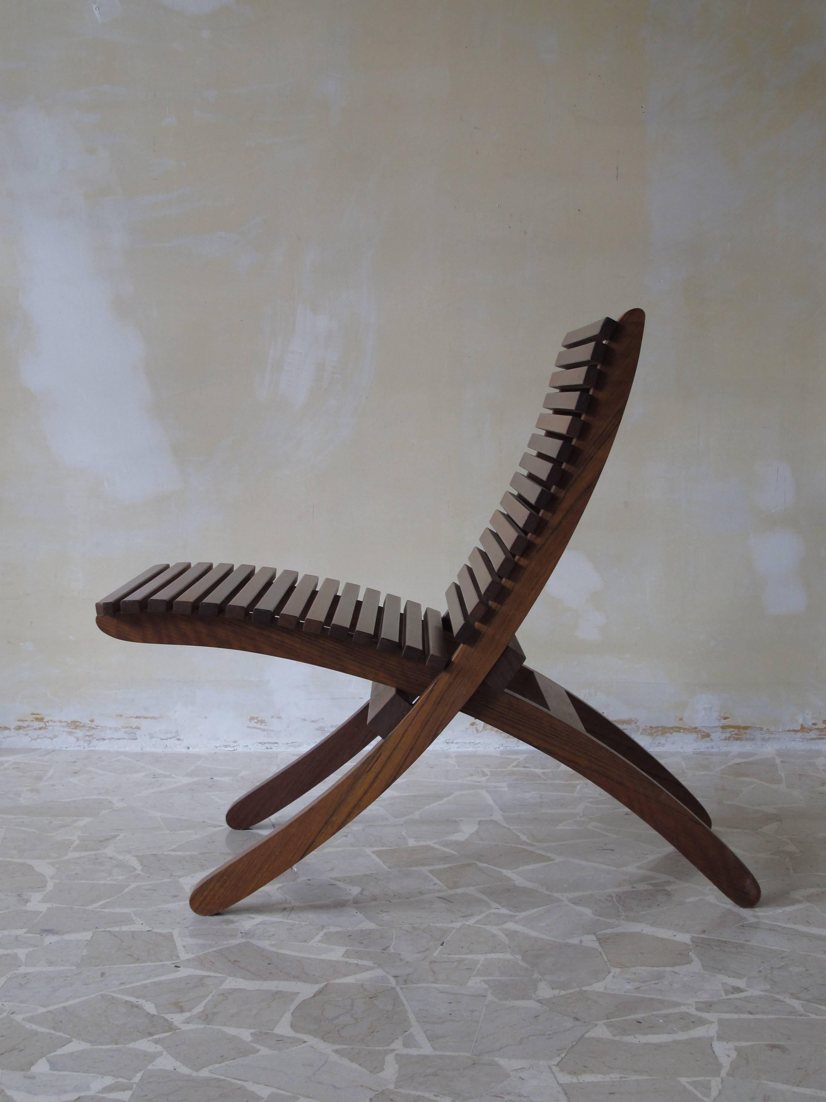 Italian chair or armchair in solid wood designed by Paolo Tilche (attributed),
the chair consists of two separable pieces, the chair is perfect for inside and outside, circa 1960s.