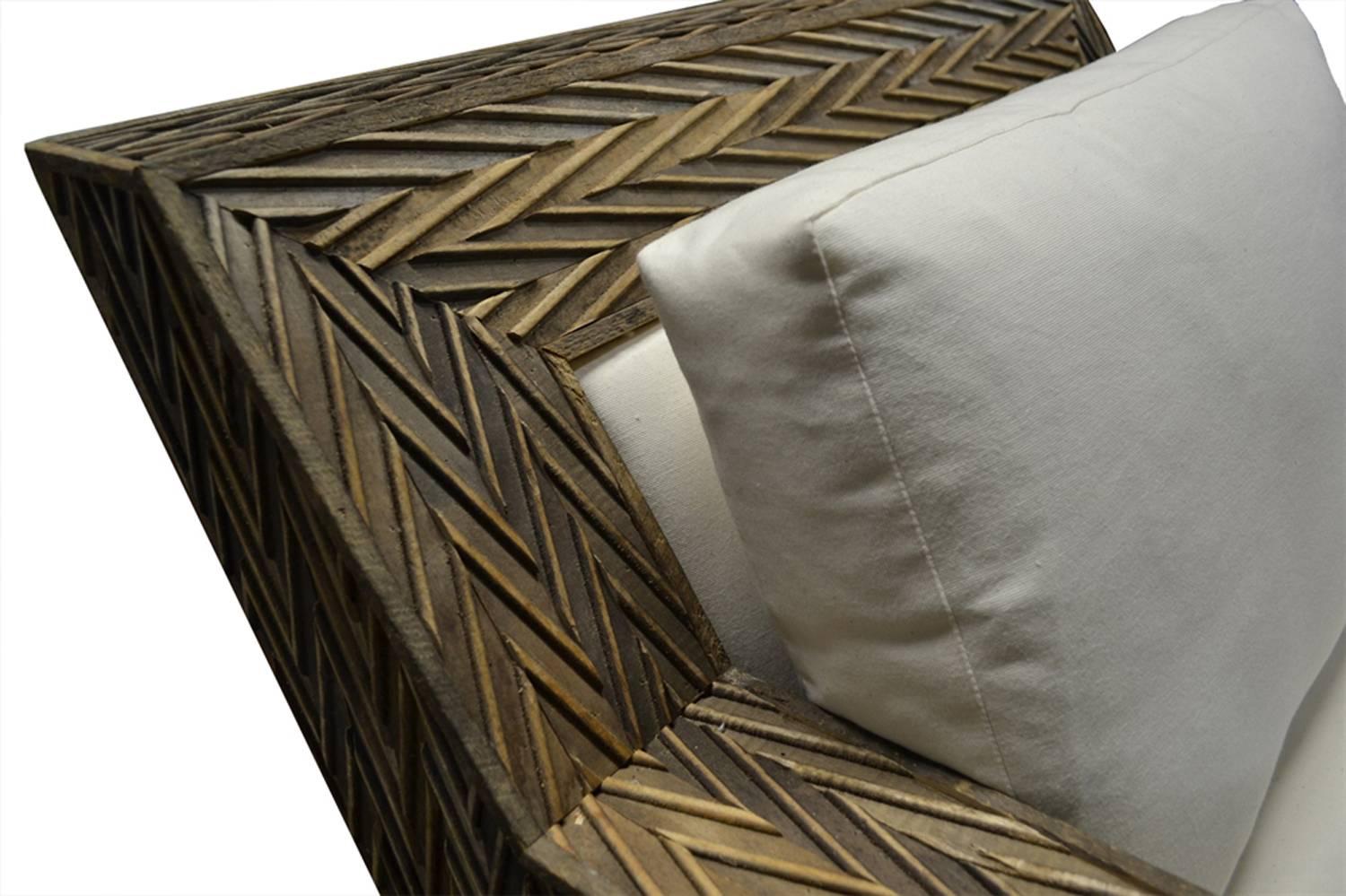 The Chevron Lounge Chair is an original design by Joann Westwater. The deeply angled frame of this decorative chair is finished in our Chevron surface covering, made of old beaded timbers. The chairs have the comfy 