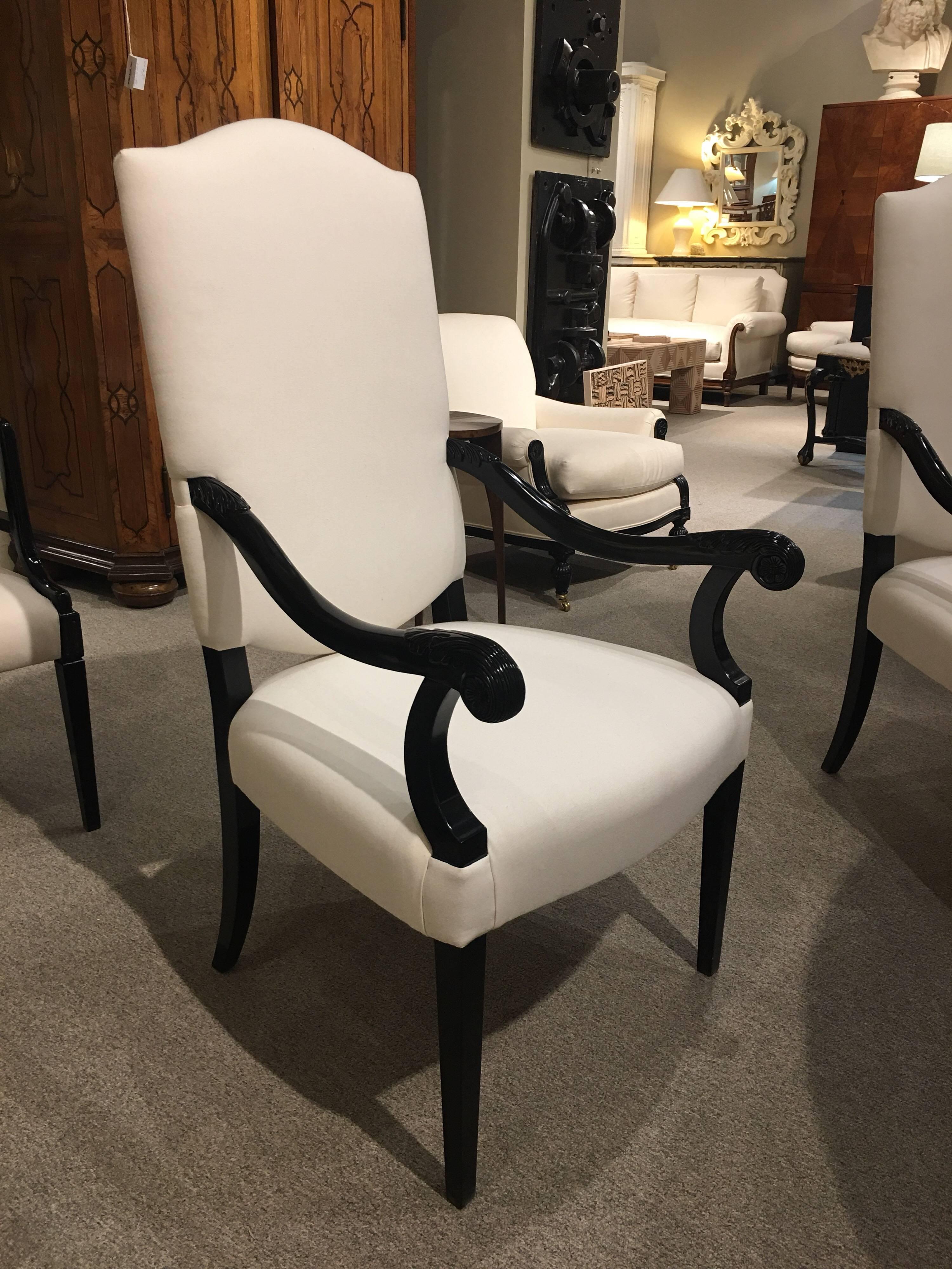 The Gascogne armchair IV is a revision of one of our wonderful dining chairs.  We've  used the original Gascogne carved arms, and designed a sleek arm support and legs to fit today's streamlined interiors.  We have a set of six , in our ebonized