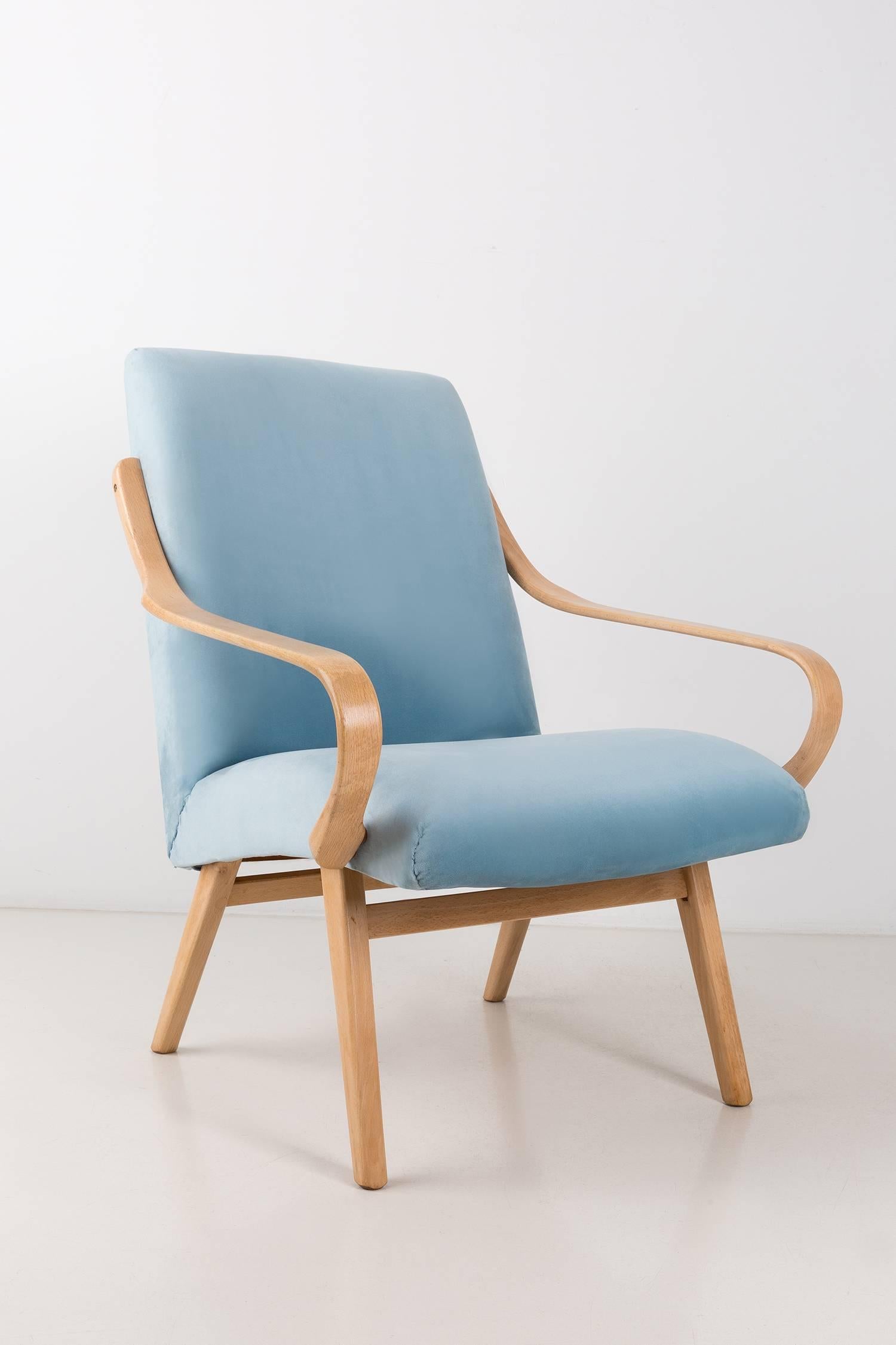 Armchairs designed by Jaroslav Šmidek, type 53. They were manufactured at the Ton factory in the 1960s in Czech Republic. Purified beech wood polished and finished with matt varnish. The upholstery that is covered with the seat and backrest is a