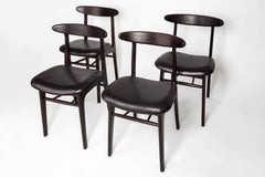 Juego de cuatro sillas de comedor vintage de cuero, años 60