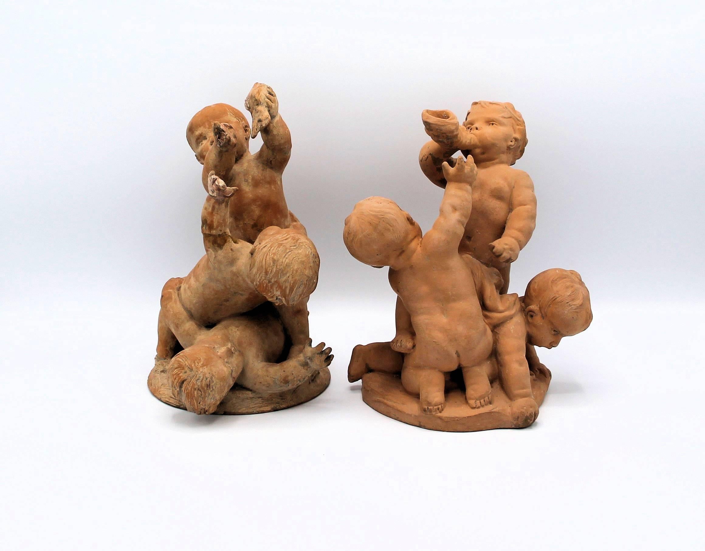 Art Nouveau Edme Samson, Pair of Terracotta Sculptures of Playing Putti For Sale