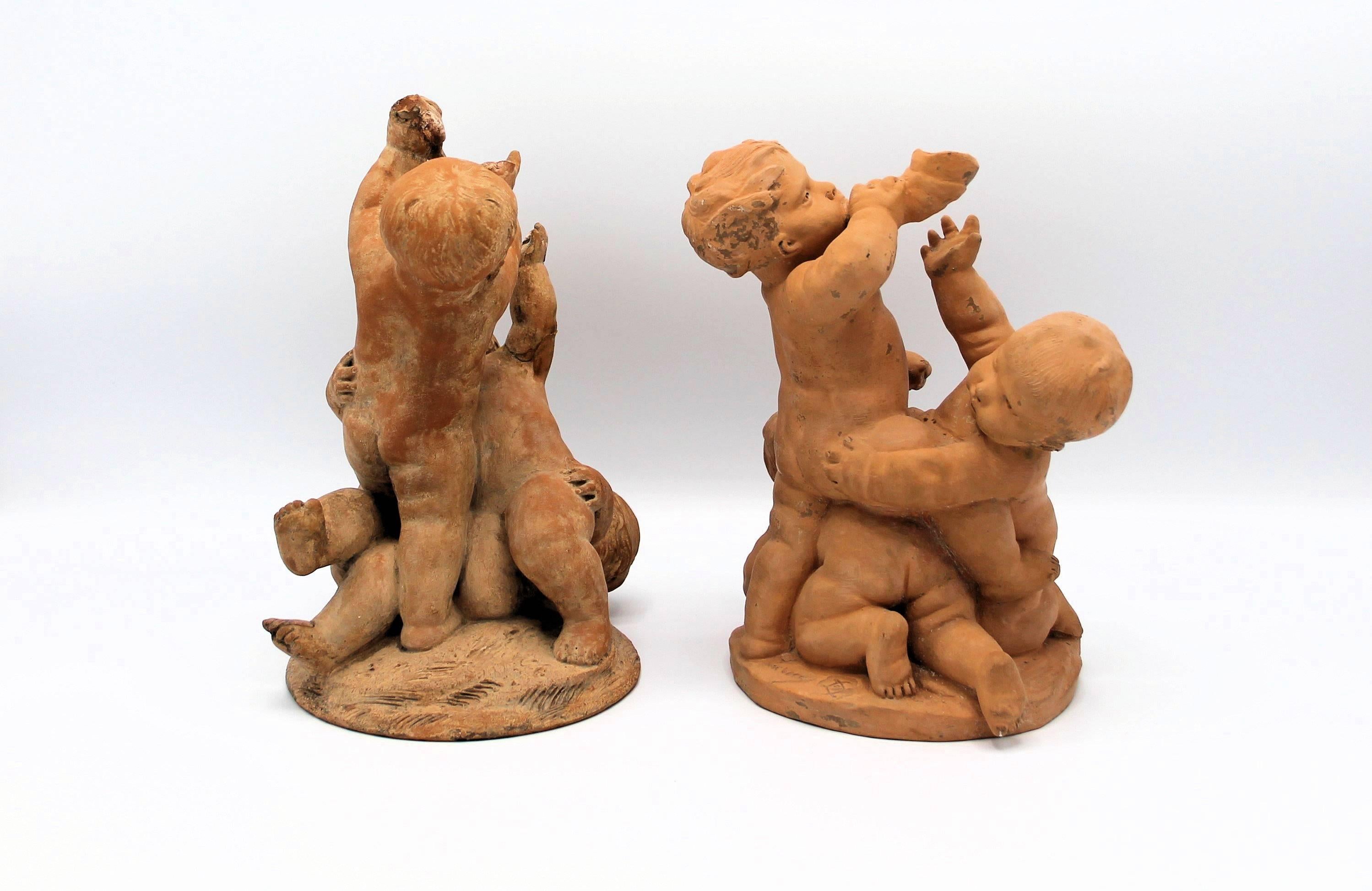 French Edme Samson, Pair of Terracotta Sculptures of Playing Putti For Sale