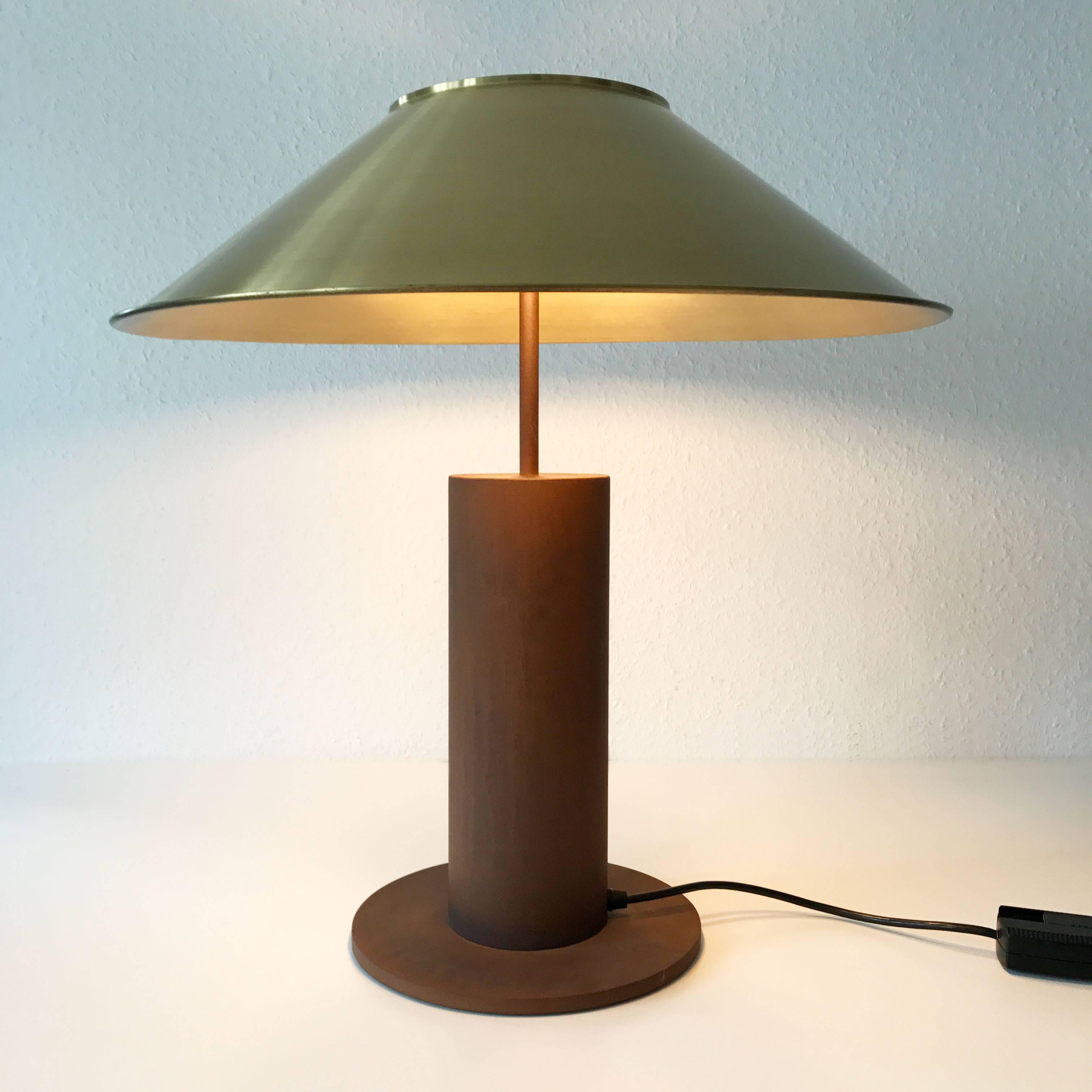 Large and rare Mid Century Modern table lamp. Designed by Peter Preller for Tecta, Germany, 1980s. With removable brass shade. 

Executed in brass and metal, the lamp comes with a dimmer and 2 x E27 / E26 Edison screw fit bulbs. It is with original