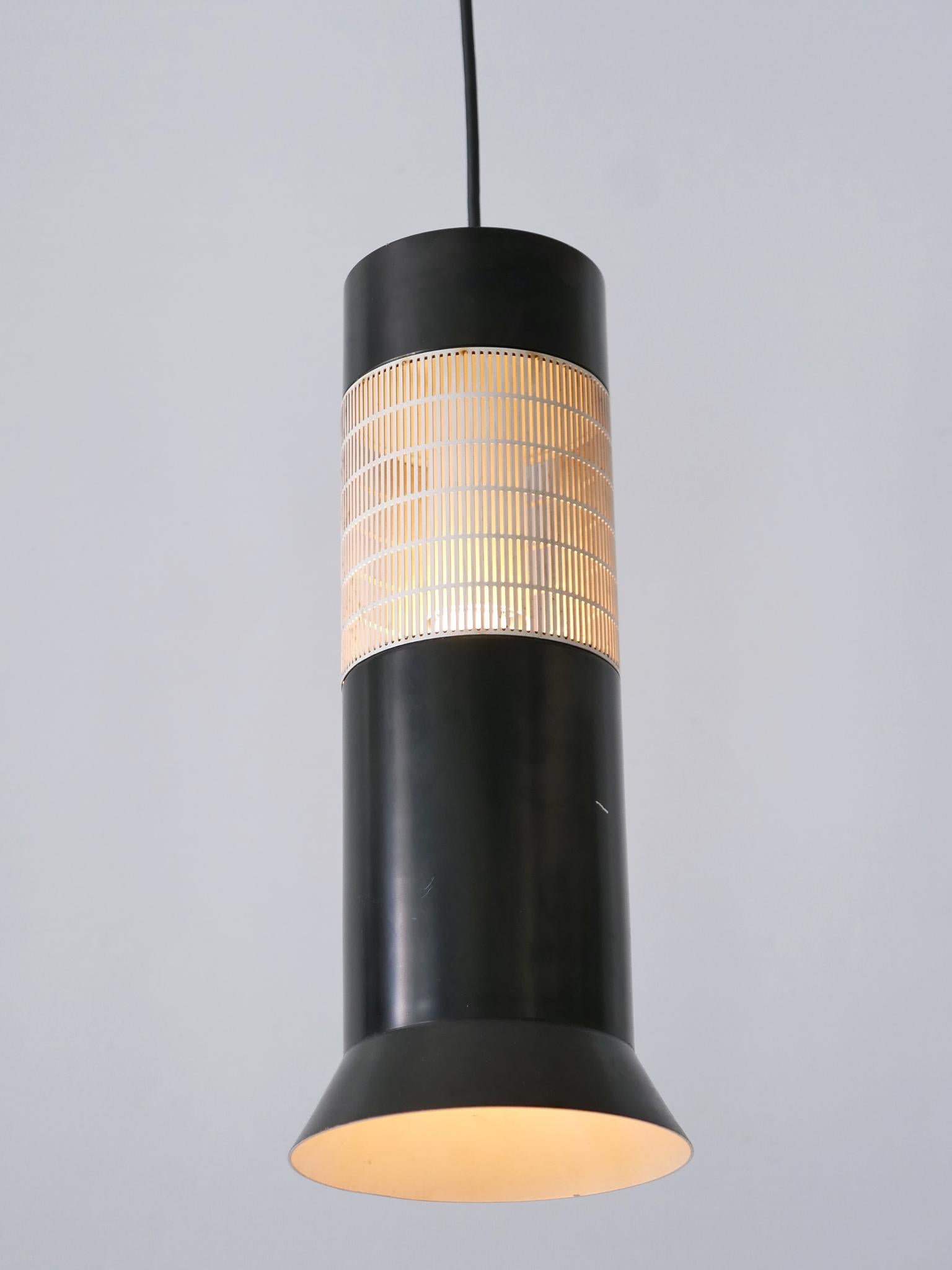 Elegant and highly decorative Mid-Century Modern bi-color pendant lamp or hanging light. Designed & manufactured probably in Germany, 1960s.

Executed in white, & black painted and perforated aluminium, the pendant lamp needs 1 x E27 / E26 Edison