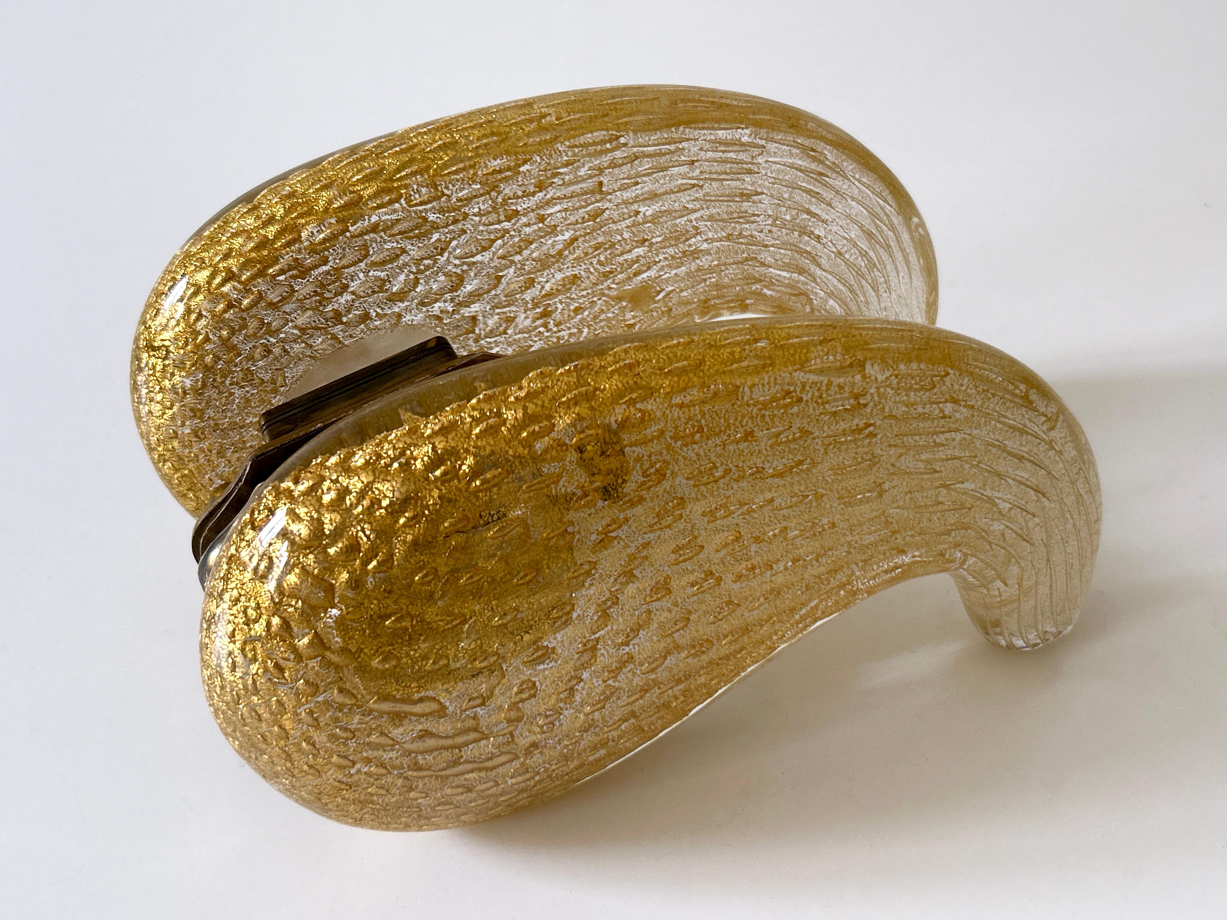 Extremely rare and elegant Mid-Century Modern double push & pull door handles in Murano glass with gold layer. Real vintage gems. Probably designed by Archimede Seguso for Seguso Vetri d'Arte, Italy, 1950.

The set consists of two individual door