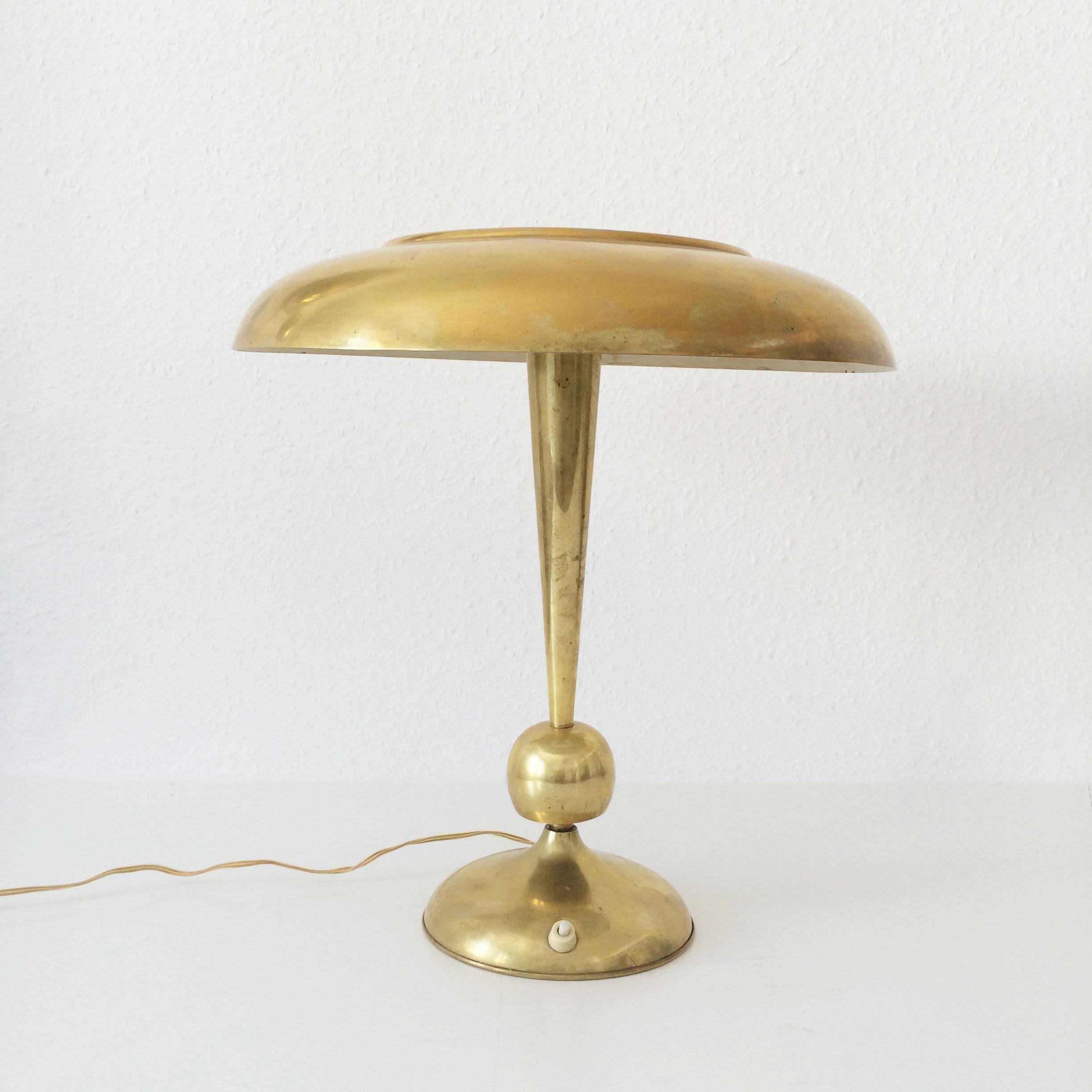 Table lamp by Oscar Torlasco. Manufactured by Lumi, Italy in 1950s. Adjustable arm. The lamp is executed with three E14 screw fit bulbs.