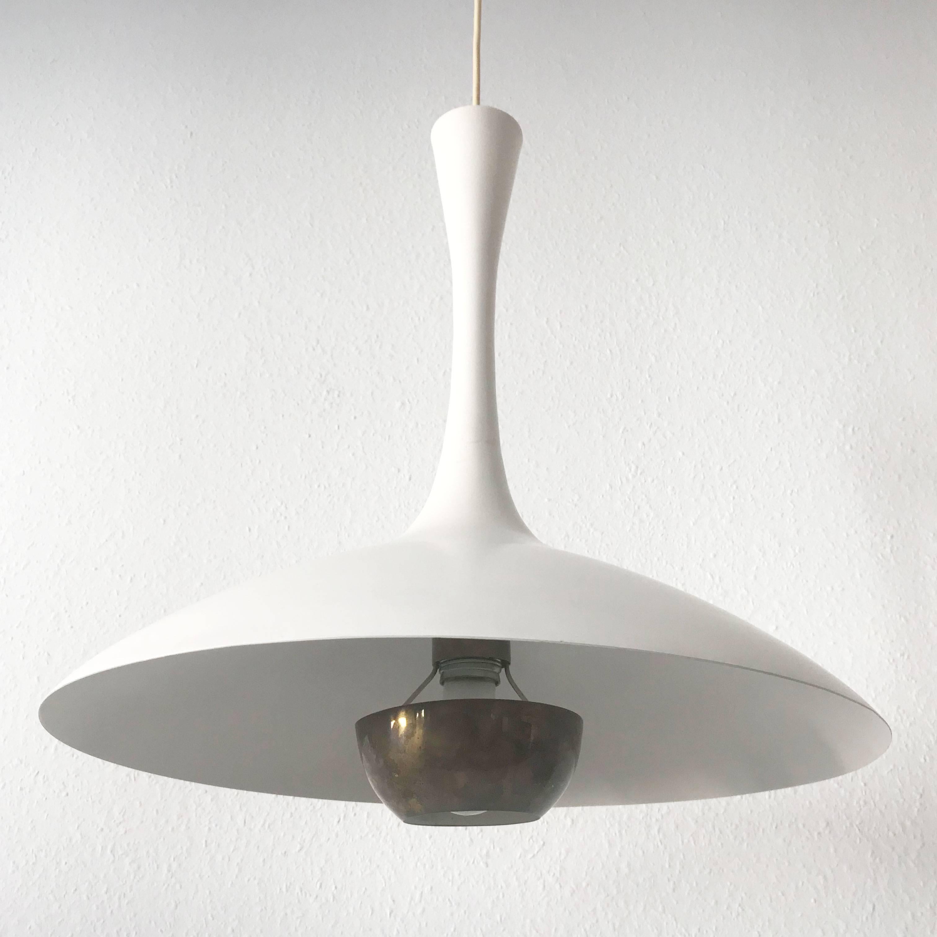 Elegant and extremely rare Mid Century Modern pendant lamp or hanging light. Designed and manufactured probably by Florian Schulz, Germany, 1960s.

Executed in white enameled aluminium sheet and brass, the lamp needs 1 x  E27 / E26 Edison screw fit