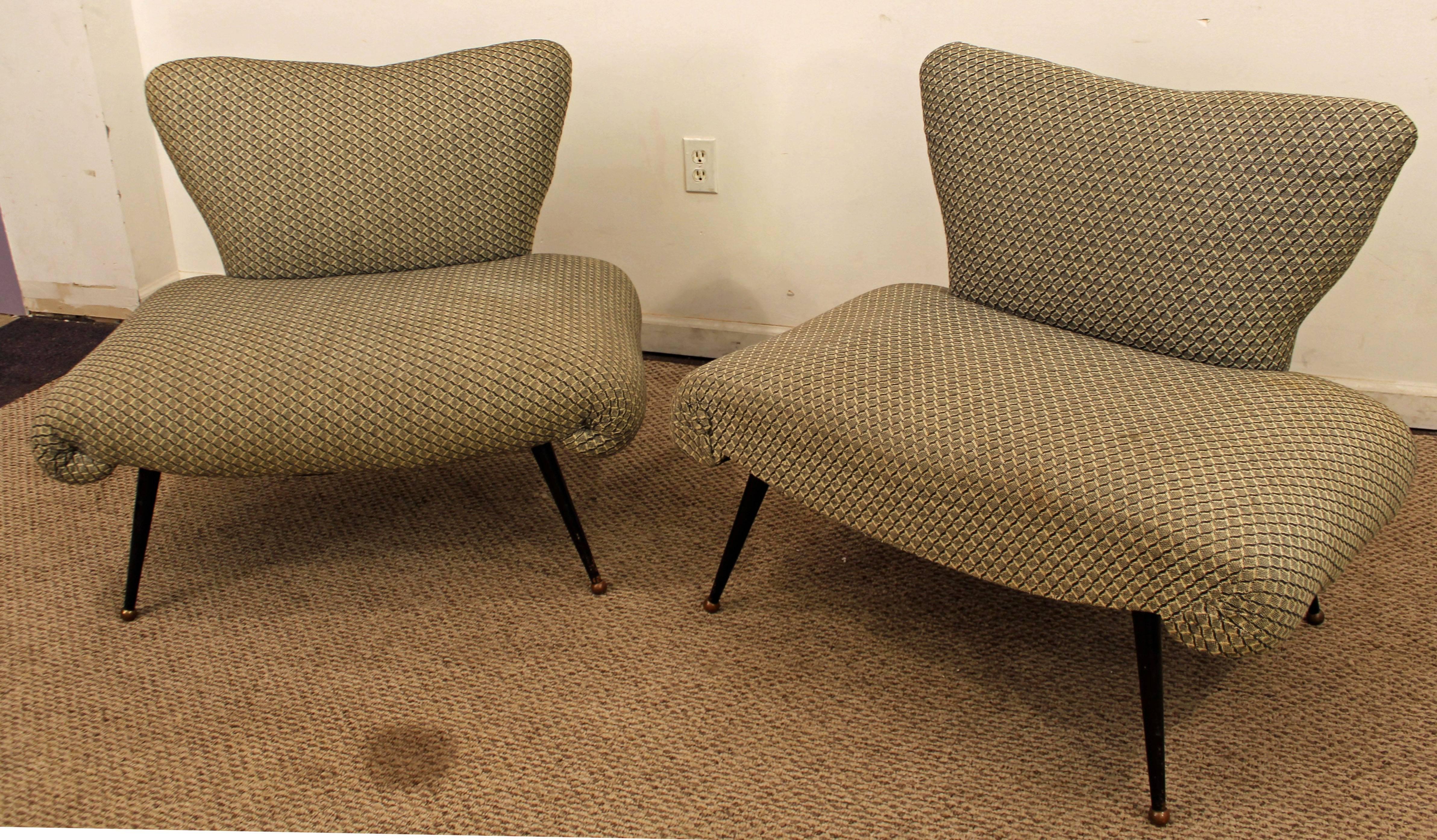 This set includes two lounge chairs, similar to the style of Marco Zanuso. The chairs have the lines and design that scream modern.

Dimensions:
35