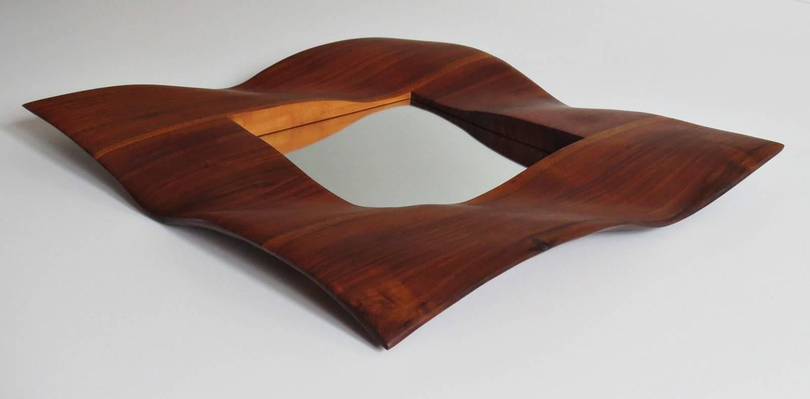 wavy walnut mirror