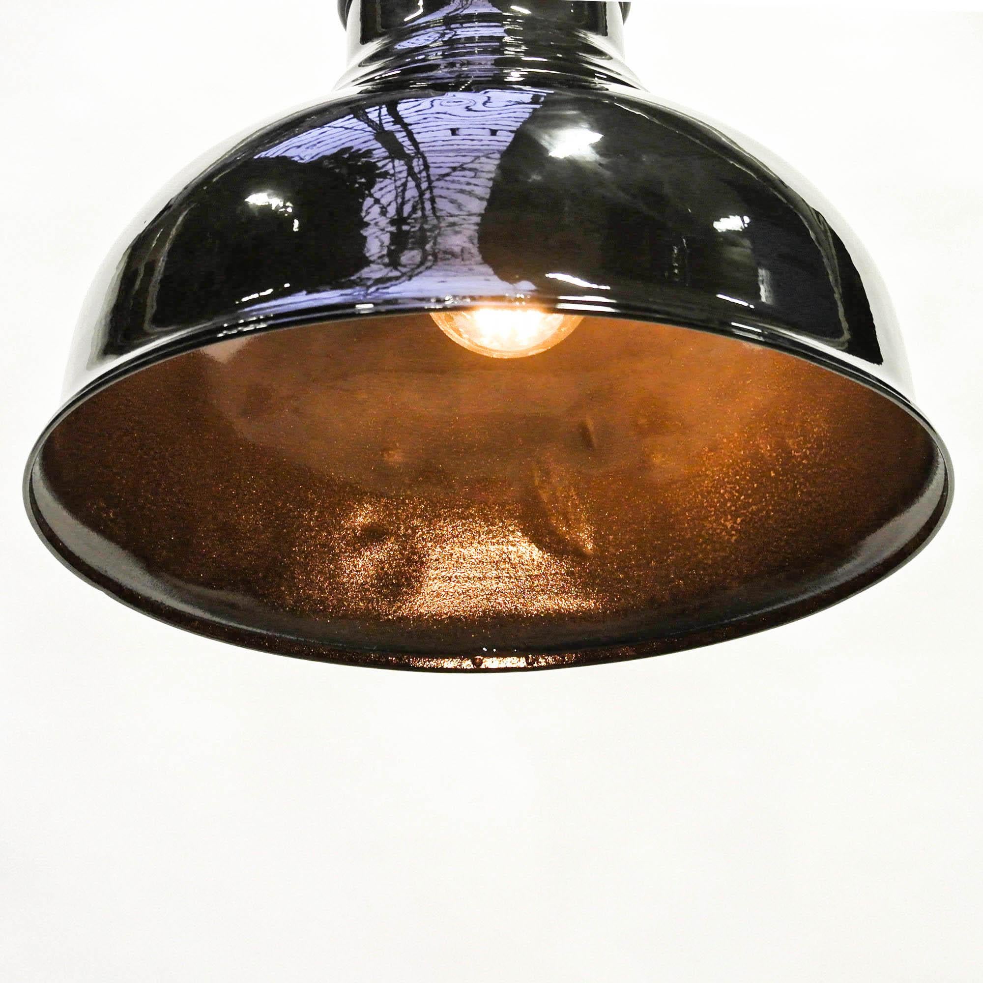 Old lamp from Paris streets, circa 1950. Made of aluminium, stripped and repainted in dark brown brilliant epoxid paint. Perfect for high ceilings du to its size, very light. Fully rewired.


   