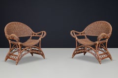 Coppia di poltrone scultoree spagnole in bambù e rattan, 1960