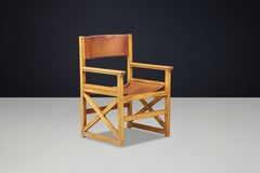 French Beech and Patinated Cognac Leather Armchair in the Style of Maison Regain