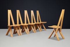 Lot de six chaises de salle à manger sculpturales en orme massif, dans le style de Pierre Chapo, 1980